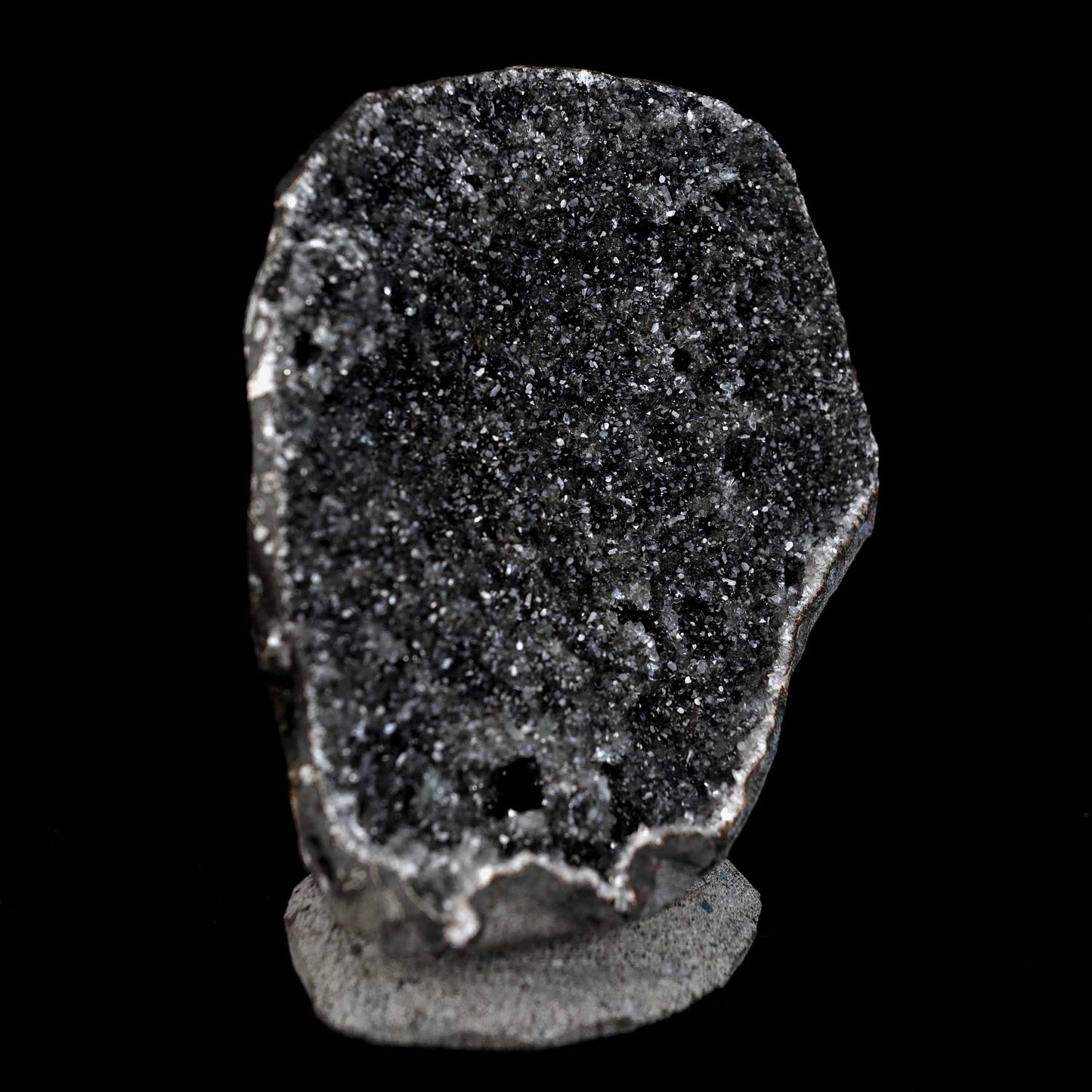 Black Sprakling Chalcedony Geode Natural Mineral Specimen # B 4629  https://www.superbminerals.us/products/black-sprakling-chalcedony-geode-natural-mineral-specimen-b-4629  Features: A massive Geode piece set with black stalactitic Chalcedony, partially covered with a glittering dreary Chalcedony druse, and facilitating a totally concentrated, deeply clear harmony hued Stilbite tie precious stone. There is another, more modest Stilbite precious stone at a corner, but it is the spotless