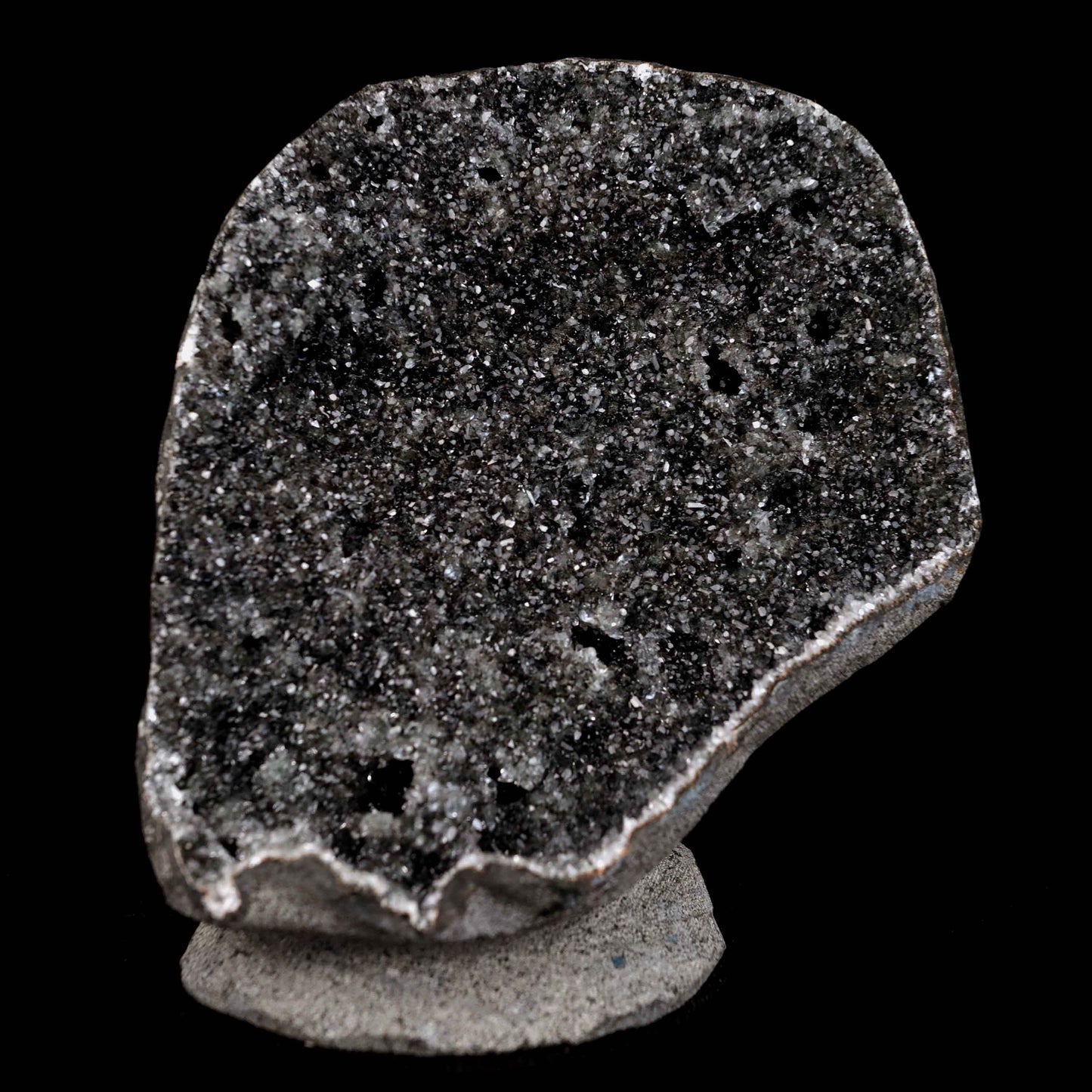 Black Sprakling Chalcedony Geode Natural Mineral Specimen # B 4629  https://www.superbminerals.us/products/black-sprakling-chalcedony-geode-natural-mineral-specimen-b-4629  Features: A massive Geode piece set with black stalactitic Chalcedony, partially covered with a glittering dreary Chalcedony druse, and facilitating a totally concentrated, deeply clear harmony hued Stilbite tie precious stone. There is another, more modest Stilbite precious stone at a corner, but it is the spotless