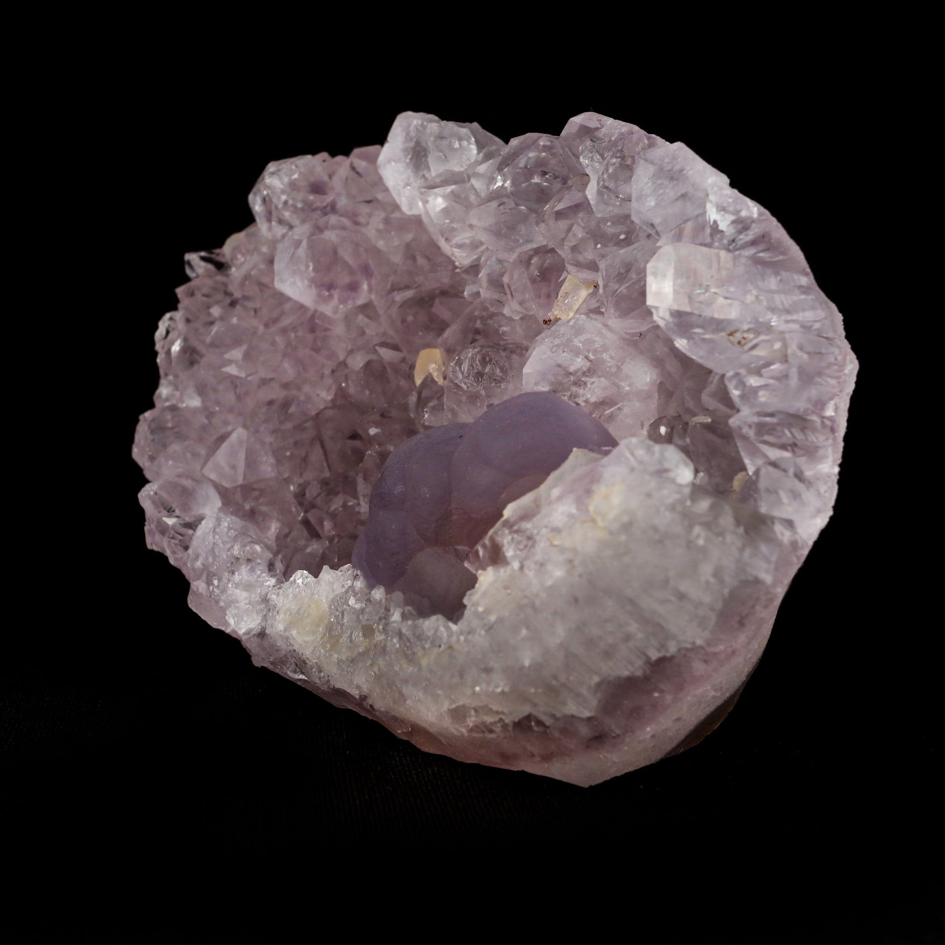 Blue Fluorite with Amethyst "Rare Find" Natural Mineral Specimen # B …  https://www.superbminerals.us/products/blue-fluorite-with-amethyst-rare-find-natural-mineral-specimen-b-4969  Features:This is a superb and unique piece featuring a large, complete and perfect spherical (botryoidal) formation of highly translucent blue colored Fluorite on a plate of lustrous amethyst. blue Fluorite spheres of this quality 