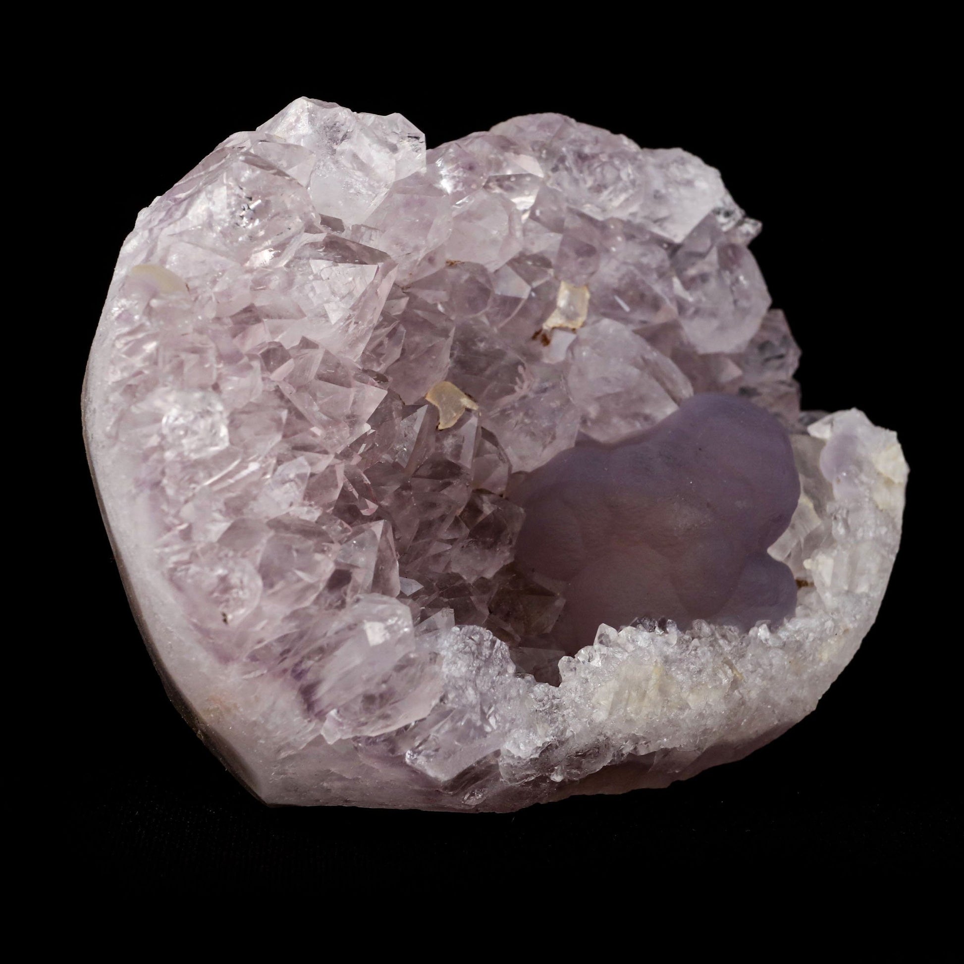 Blue Fluorite with Amethyst "Rare Find" Natural Mineral Specimen # B …  https://www.superbminerals.us/products/blue-fluorite-with-amethyst-rare-find-natural-mineral-specimen-b-4969  Features:This is a superb and unique piece featuring a large, complete and perfect spherical (botryoidal) formation of highly translucent blue colored Fluorite on a plate of lustrous amethyst. blue Fluorite spheres of this quality 