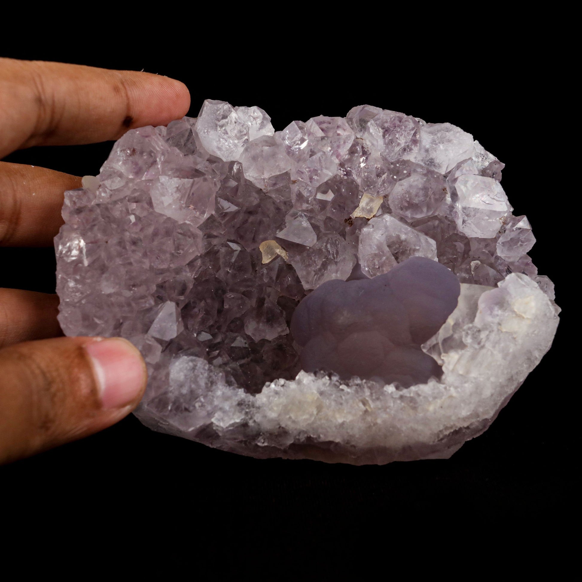 Blue Fluorite with Amethyst "Rare Find" Natural Mineral Specimen # B …  https://www.superbminerals.us/products/blue-fluorite-with-amethyst-rare-find-natural-mineral-specimen-b-4969  Features:This is a superb and unique piece featuring a large, complete and perfect spherical (botryoidal) formation of highly translucent blue colored Fluorite on a plate of lustrous amethyst. blue Fluorite spheres of this quality 