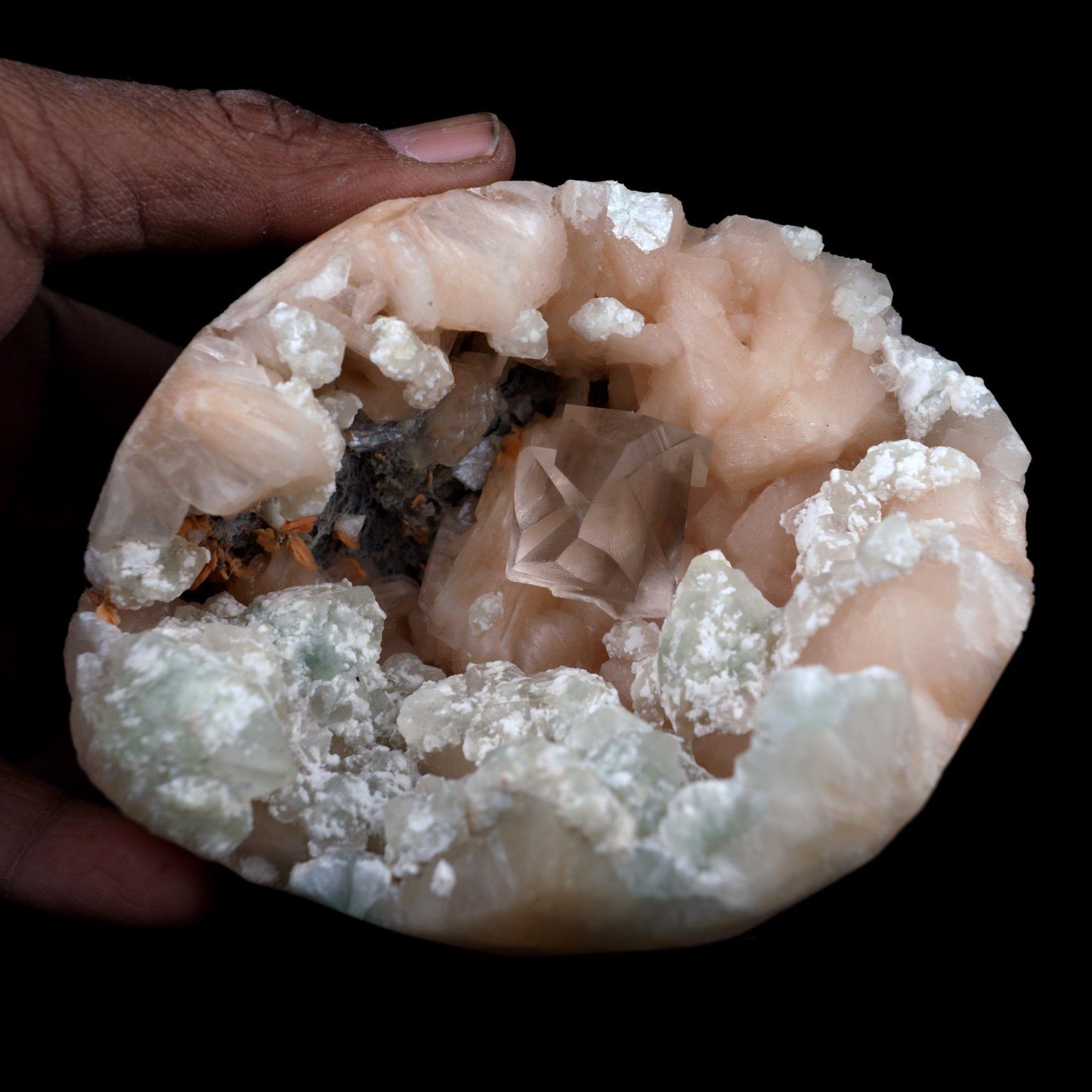 CalCalcite with Stilbite Apophyllite Geode Natural Mineral Specimen # …  https://www.superbminerals.us/products/copy-of-fluorite-botryoidal-on-mm-quartz-plate-natural-mineral-specimen-b-3949  Features Stunning specimen. It features a large, lustrous, transparent complex Calcite crystal, coverd with translucent, peach-colored intersecting Stilbite crystals, and numerous Apophyllite crystals, all set on a matrix of Chalcedony geode formation. It’s just an amazing piece – the clarity, contrast, symmetry