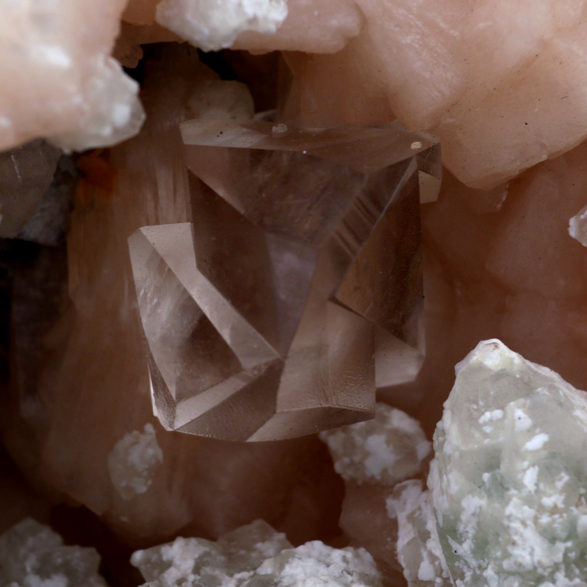 CalCalcite with Stilbite Apophyllite Geode Natural Mineral Specimen # …  https://www.superbminerals.us/products/copy-of-fluorite-botryoidal-on-mm-quartz-plate-natural-mineral-specimen-b-3949  Features Stunning specimen. It features a large, lustrous, transparent complex Calcite crystal, coverd with translucent, peach-colored intersecting Stilbite crystals, and numerous Apophyllite crystals, all set on a matrix of Chalcedony geode formation. It’s just an amazing piece – the clarity, contrast, symmetry