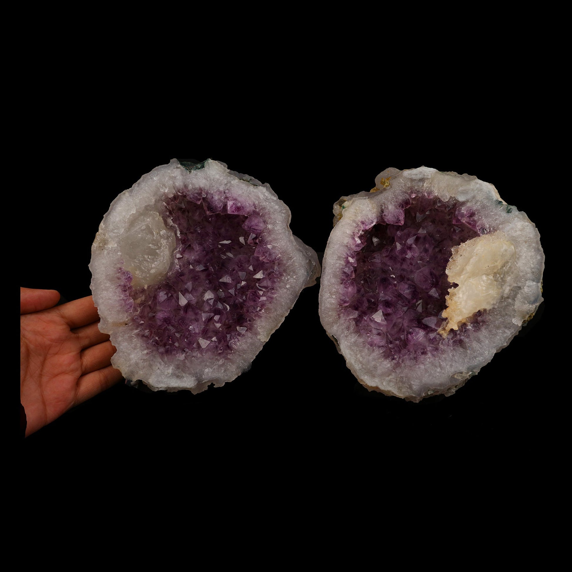 Calcite Crystal Inside Amethyst Two Havle Geode Natural Mineral Specim…  https://www.superbminerals.us/products/calcite-crystal-inside-amethyst-two-havle-geode-natural-mineral-specimen-b-5243  Features: This essay highlights the importance of never judging a book by its cover. When you look at these two halves together, it's plain and unappealing. In fact, it's unappealing. It's amazing to see the sparkling, purple Amethyst crystals lining each half of the chamber as it splits apart!Even the edge