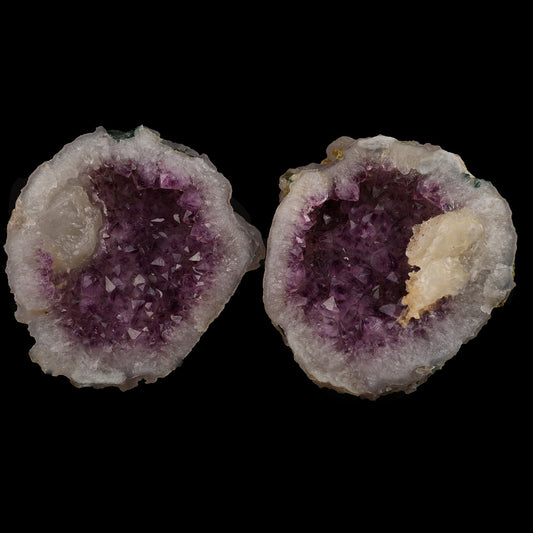 Calcite Crystal Inside Amethyst Two Havle Geode Natural Mineral Specim…  https://www.superbminerals.us/products/calcite-crystal-inside-amethyst-two-havle-geode-natural-mineral-specimen-b-5243  Features: This essay highlights the importance of never judging a book by its cover. When you look at these two halves together, it's plain and unappealing. In fact, it's unappealing. It's amazing to see the sparkling, purple Amethyst crystals lining each half of the chamber as it splits apart!Even the edge
