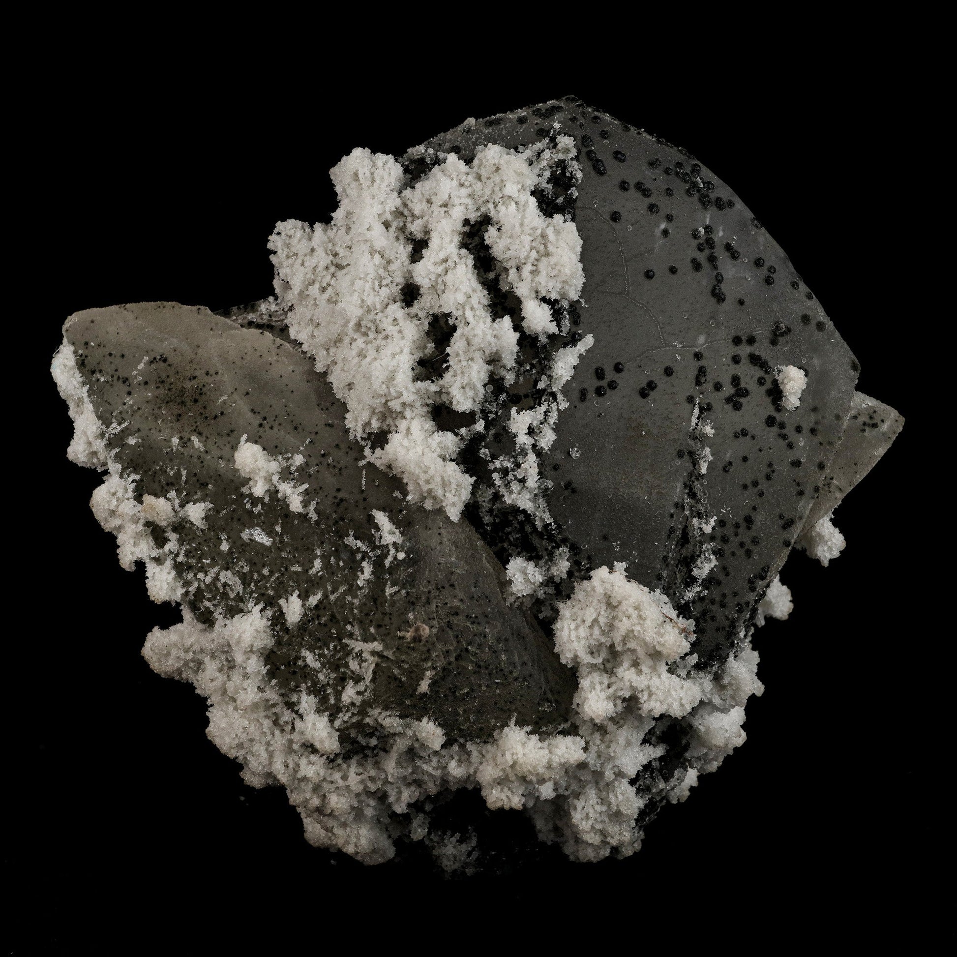 Calcite with Julgodite Rare Find Natural Mineral Specimen # B 5113  https://www.superbminerals.us/products/calcite-with-julgodite-rare-find-natural-mineral-specimen-b-5113  Features: The rare mineral Julgodite covers the basalt matrix. The small crystals, which are quite dark, are noticeable as they contrast well with the crystals of Stilbites, which are doubly-terminated, brilliant, water clear and with sharp pyramids. A floater crystal of Calcite with deposits of Julgoldite. Julgoldite