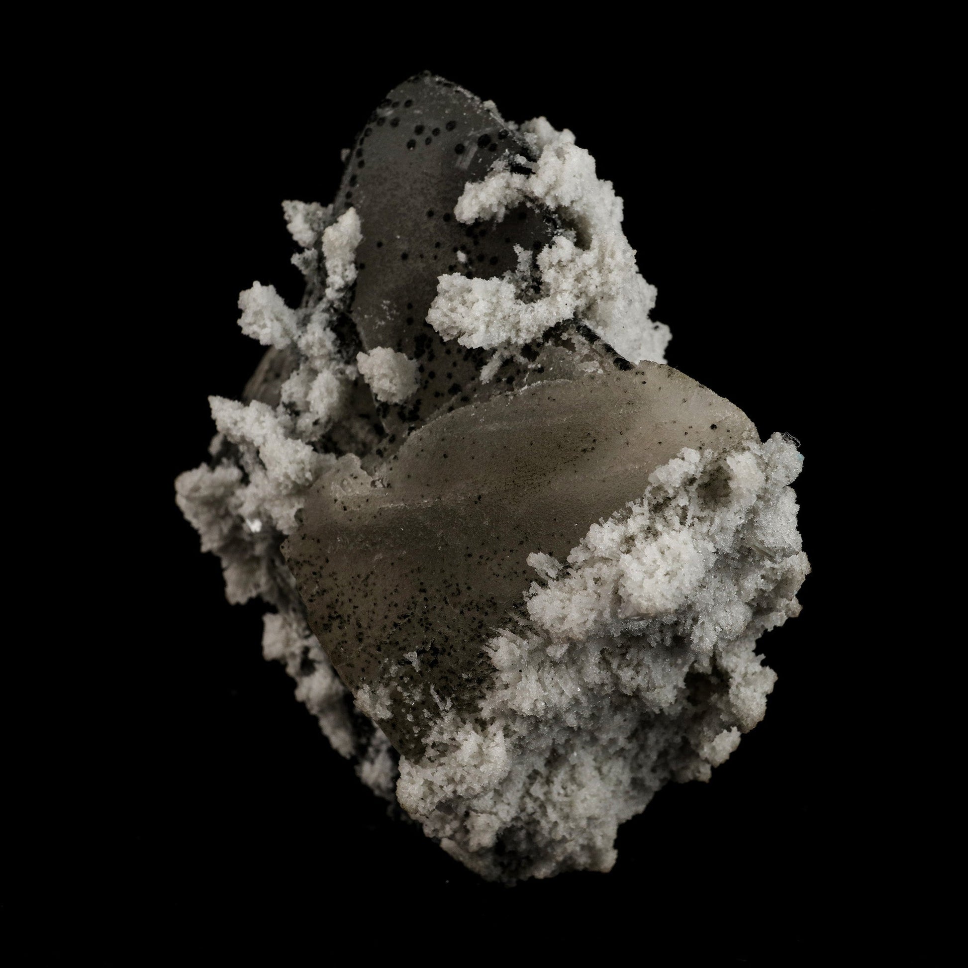 Calcite with Julgodite Rare Find Natural Mineral Specimen # B 5113  https://www.superbminerals.us/products/calcite-with-julgodite-rare-find-natural-mineral-specimen-b-5113  Features: The rare mineral Julgodite covers the basalt matrix. The small crystals, which are quite dark, are noticeable as they contrast well with the crystals of Stilbites, which are doubly-terminated, brilliant, water clear and with sharp pyramids. A floater crystal of Calcite with deposits of Julgoldite. Julgoldite