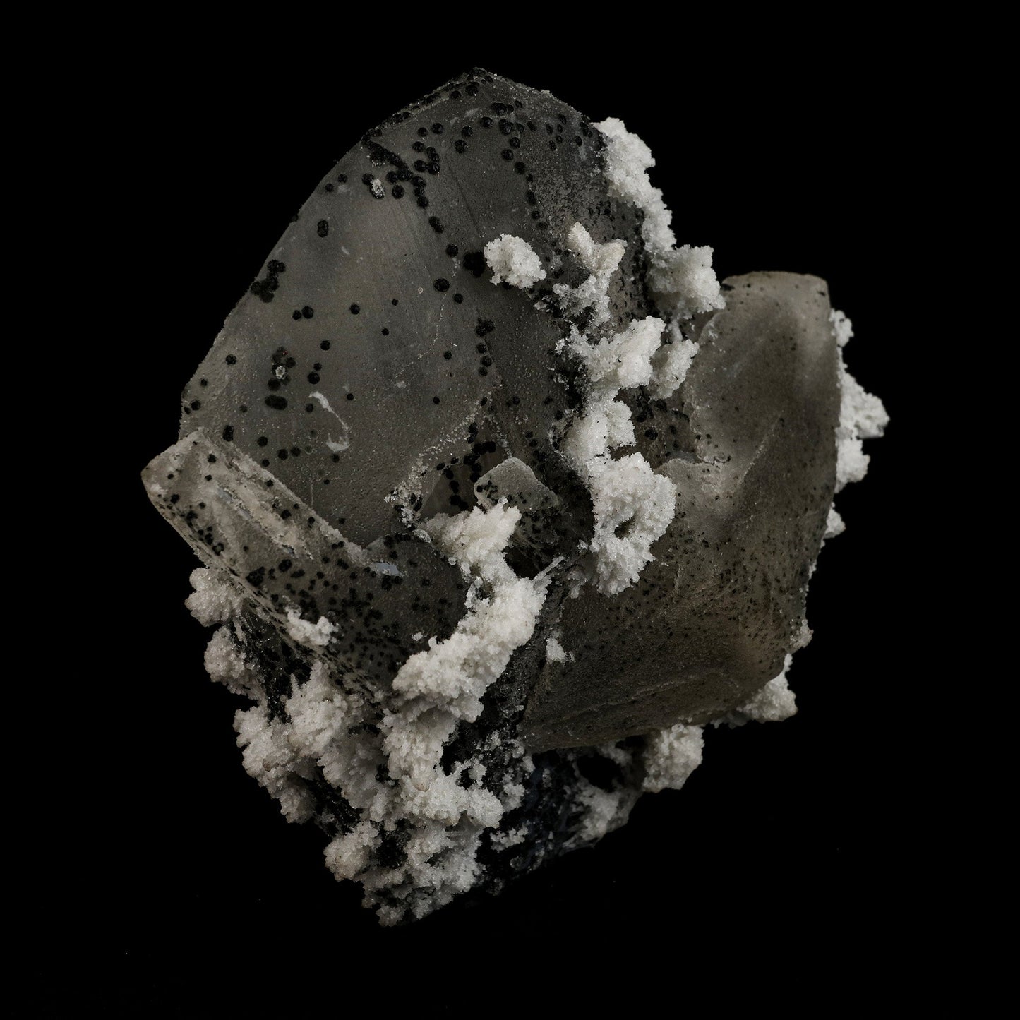 Calcite with Julgodite Rare Find Natural Mineral Specimen # B 5113  https://www.superbminerals.us/products/calcite-with-julgodite-rare-find-natural-mineral-specimen-b-5113  Features: The rare mineral Julgodite covers the basalt matrix. The small crystals, which are quite dark, are noticeable as they contrast well with the crystals of Stilbites, which are doubly-terminated, brilliant, water clear and with sharp pyramids. A floater crystal of Calcite with deposits of Julgoldite. Julgoldite