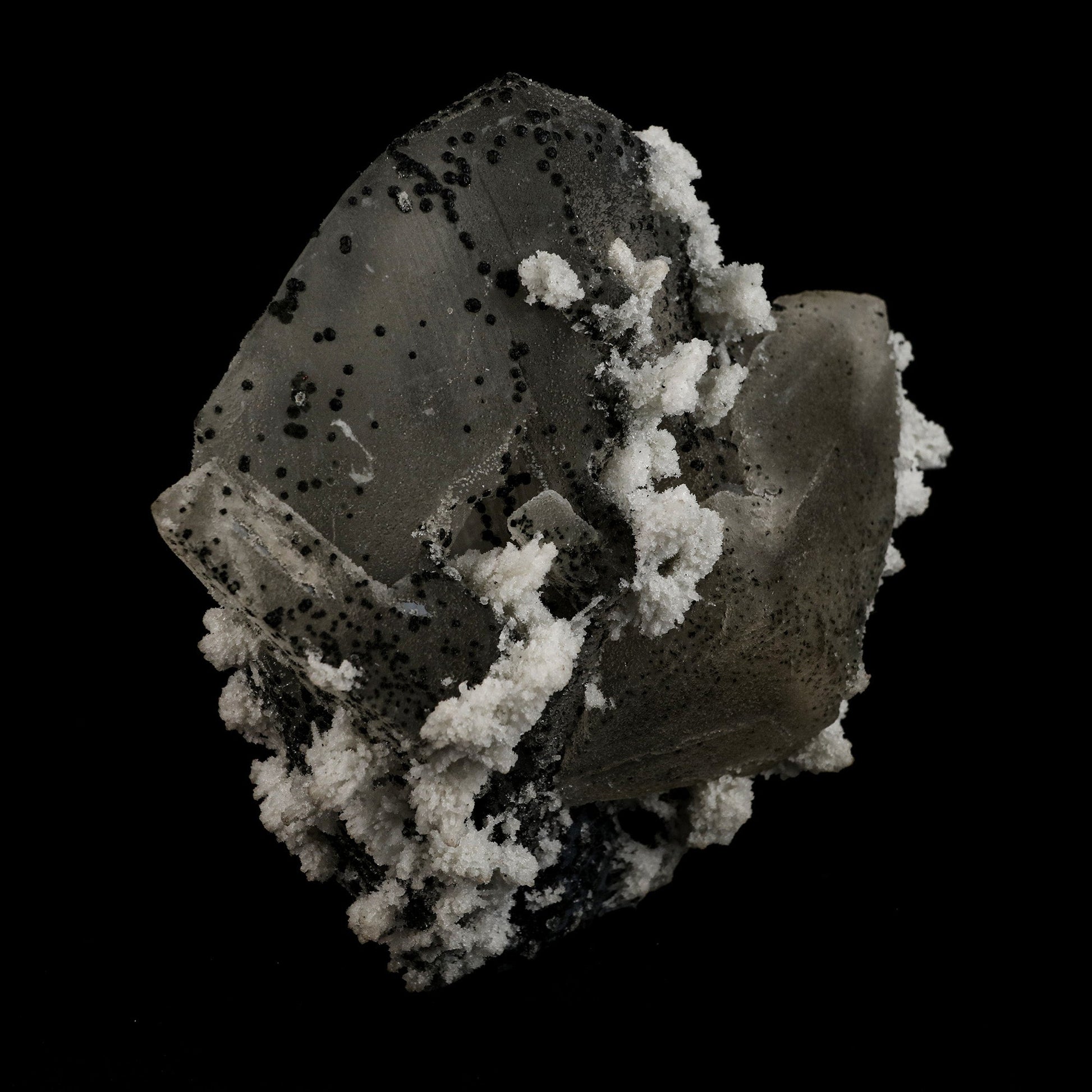 Calcite with Julgodite Rare Find Natural Mineral Specimen # B 5113  https://www.superbminerals.us/products/calcite-with-julgodite-rare-find-natural-mineral-specimen-b-5113  Features: The rare mineral Julgodite covers the basalt matrix. The small crystals, which are quite dark, are noticeable as they contrast well with the crystals of Stilbites, which are doubly-terminated, brilliant, water clear and with sharp pyramids. A floater crystal of Calcite with deposits of Julgoldite. Julgoldite