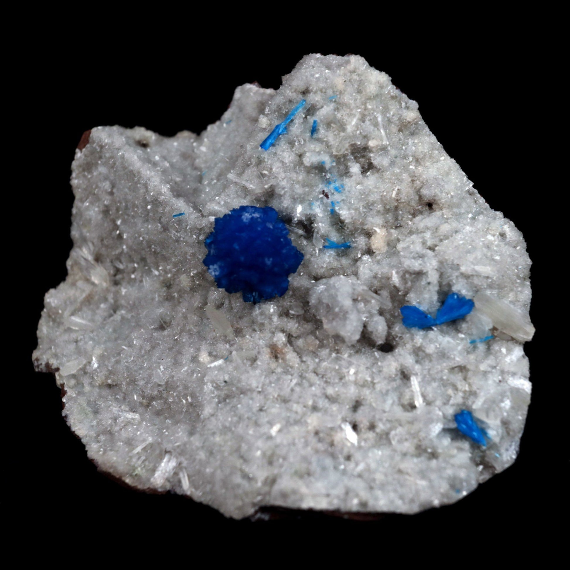 Cavansite Ball on Heuandite (Rare Find) Natural Mineral Specimen # B …  https://www.superbminerals.us/products/cavansite-ball-on-heuandite-rare-find-natural-mineral-specimen-b-4871  Features: Radial group of exquisite deep blue Cavansite on basalt with accompanying beige micro-crystals of Heulandite makes up this stunning work. There's no obvious damage, however the front of the Cavansite "balls" has a small separation mark where it grew up against the pocket wall. It's of excellent 