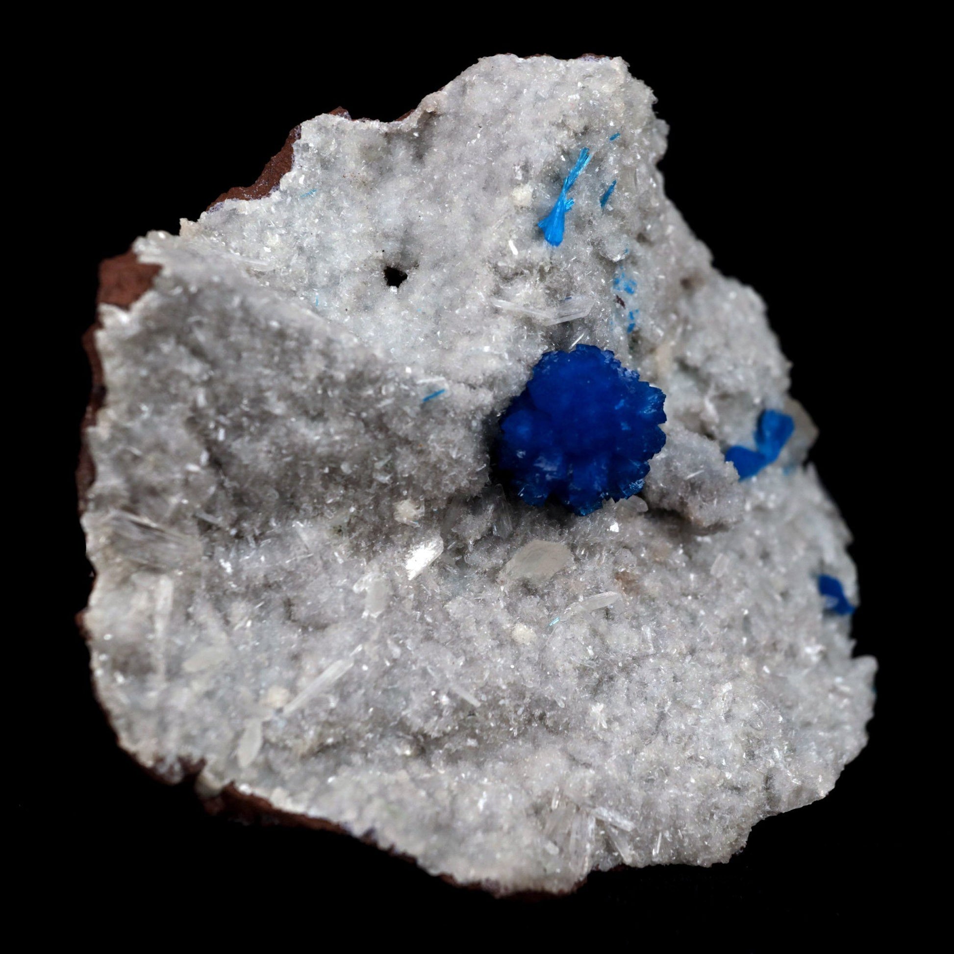 Cavansite Ball on Heuandite (Rare Find) Natural Mineral Specimen # B …  https://www.superbminerals.us/products/cavansite-ball-on-heuandite-rare-find-natural-mineral-specimen-b-4871  Features: Radial group of exquisite deep blue Cavansite on basalt with accompanying beige micro-crystals of Heulandite makes up this stunning work. There's no obvious damage, however the front of the Cavansite "balls" has a small separation mark where it grew up against the pocket wall. It's of excellent 