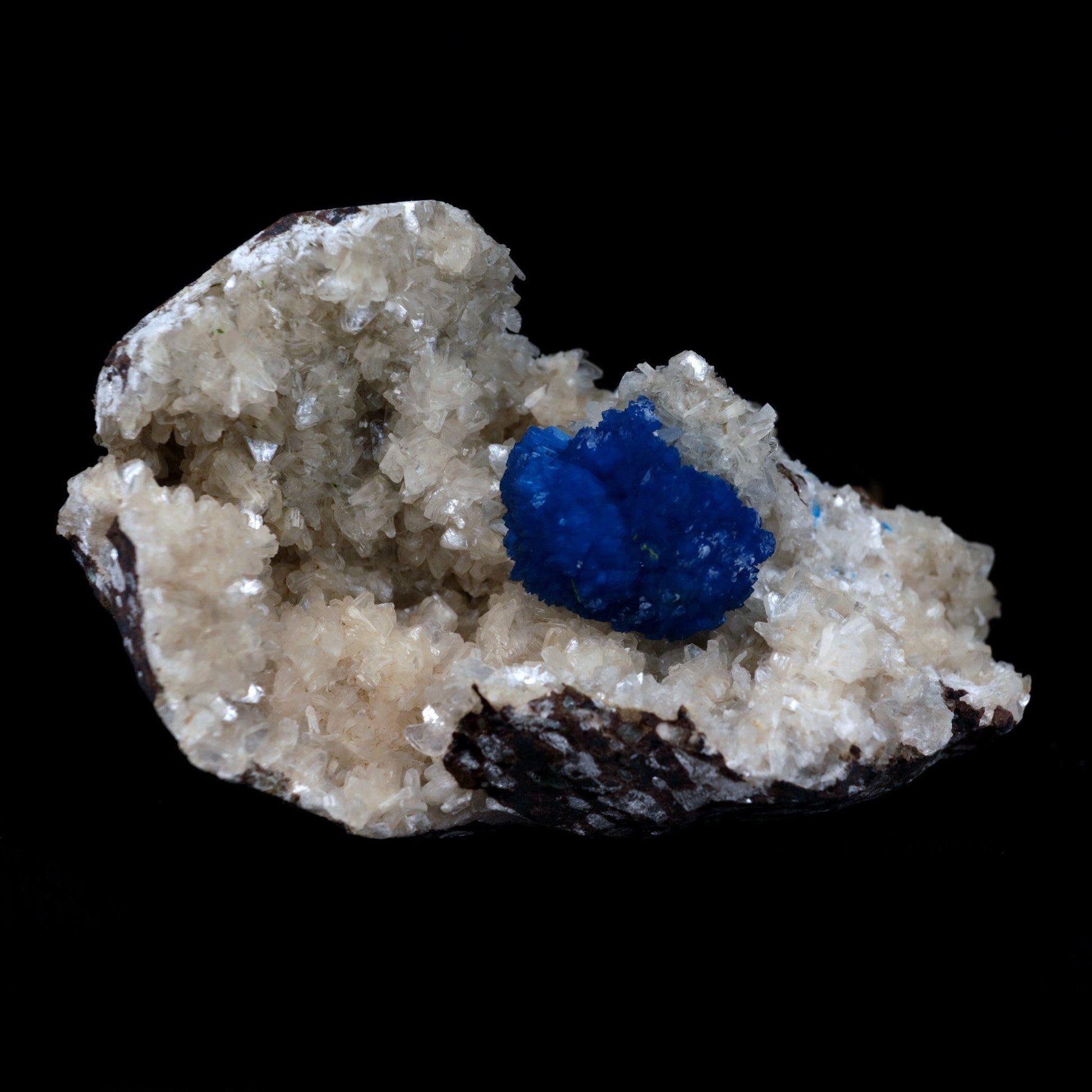 Cavansite Ball on Heuandite (Rare Find) Natural Mineral Specimen # B …  https://www.superbminerals.us/products/cavansite-ball-on-heuandite-rare-find-natural-mineral-specimen-b-4872  Features: This magnificent piece is composed of a radial group of superb deep blue Cavansite crystals on basalt, You can see several various forms of crystallisation in this piece, all of which have the same, strong, saturated blue colour that is honestly 