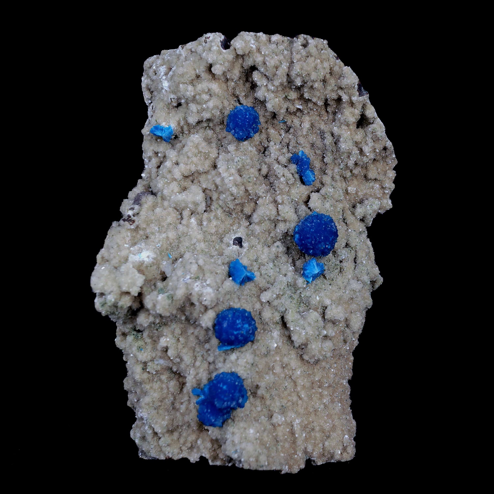 Cavansite Blue Puff Balls on Heuladnite Natural Mineral Specimen # B 4…  https://www.superbminerals.us/products/cavansite-blue-puff-balls-on-heuladnite-natural-mineral-specimen-b-4013  Features These are gorgeous, deep blue Cavansite crystal aggregations on a micro Stilbite crystal encrusted matrix, collected from the Wagholi Quarry in the Pune district of India. Cavansite tends to form deep blue crystal aggregates, generally in the form of balls, up to a couple centimeters in size. 