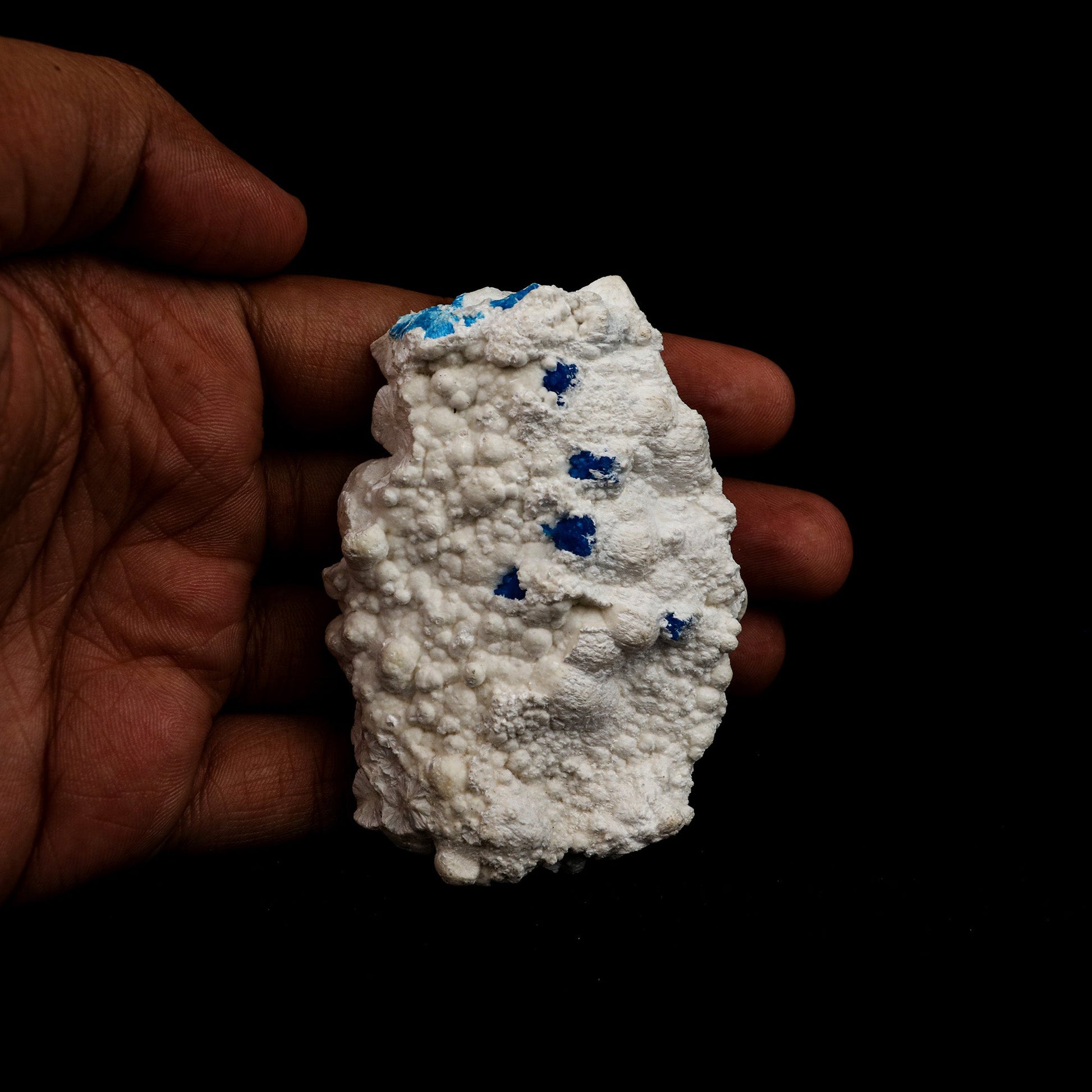 Cavansite on Mordenite Rare Find Natural Mineral Specimen # B 5141  https://www.superbminerals.us/products/cavansite-on-mordenite-rare-find-natural-mineral-specimen-b-5141  Features: Unusual combination of a large spherical rosette diameter of blue-green cavansite crystals on white mordenite-coated matrix . Primary Mineral(s): Cavansite Secondary Mineral(s): MordeniteMatrix: N/A 3 Inch x 2 InchWeight : 76 GmsLocality: Pune, Maharashtra, India Year of Discovery: 2021