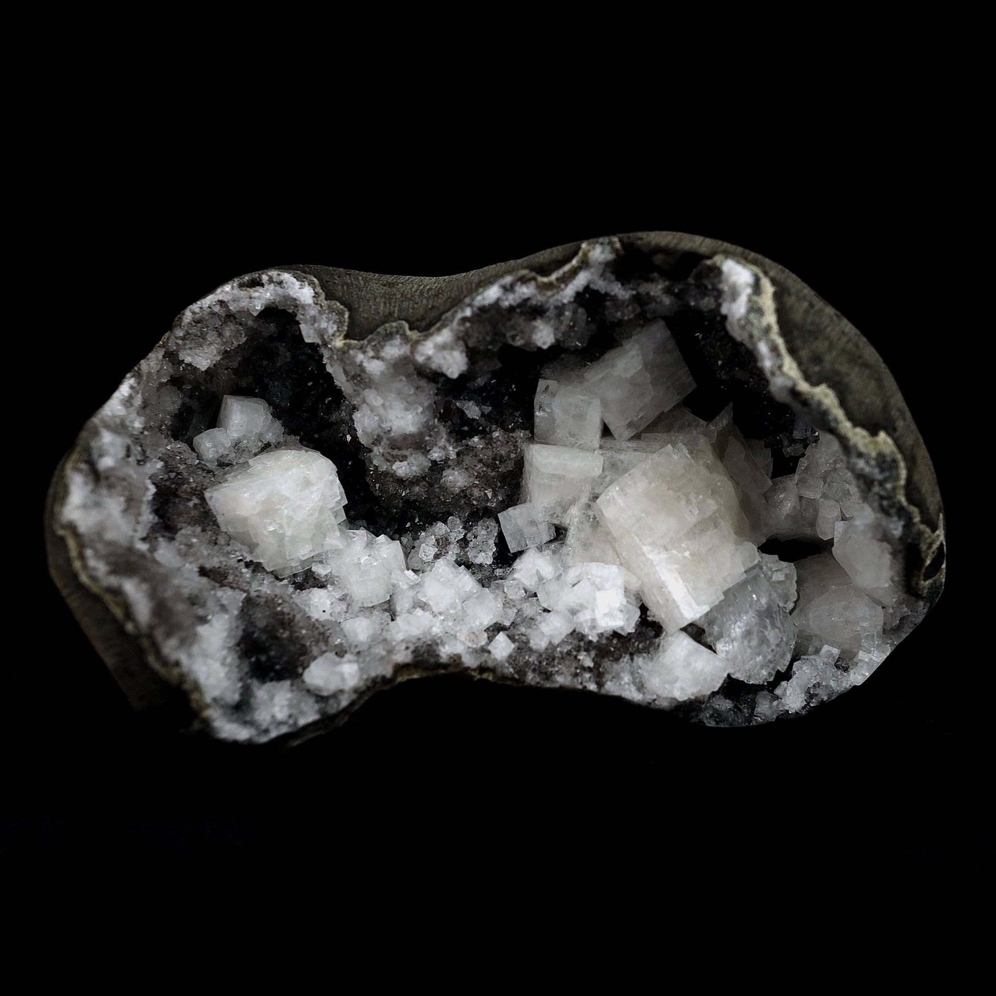Chabazite Pesudeo Crystals inside Chalcedony Vug Natural Mineral Speci…  https://www.superbminerals.us/products/chabazite-pesudeo-crystals-inside-chalcedony-vug-natural-mineral-specimen-b-4661  Features: Exquisite basalt vug lined with sparkly drusy chalcedony, and containing excellent crystals of Chabazite. The Chabazite is over across, has superb luster, and appears to be twinned. The Epistilbite crystals are tall and have good luster. A great combination piece.Primary Mineral(s): Chabazite