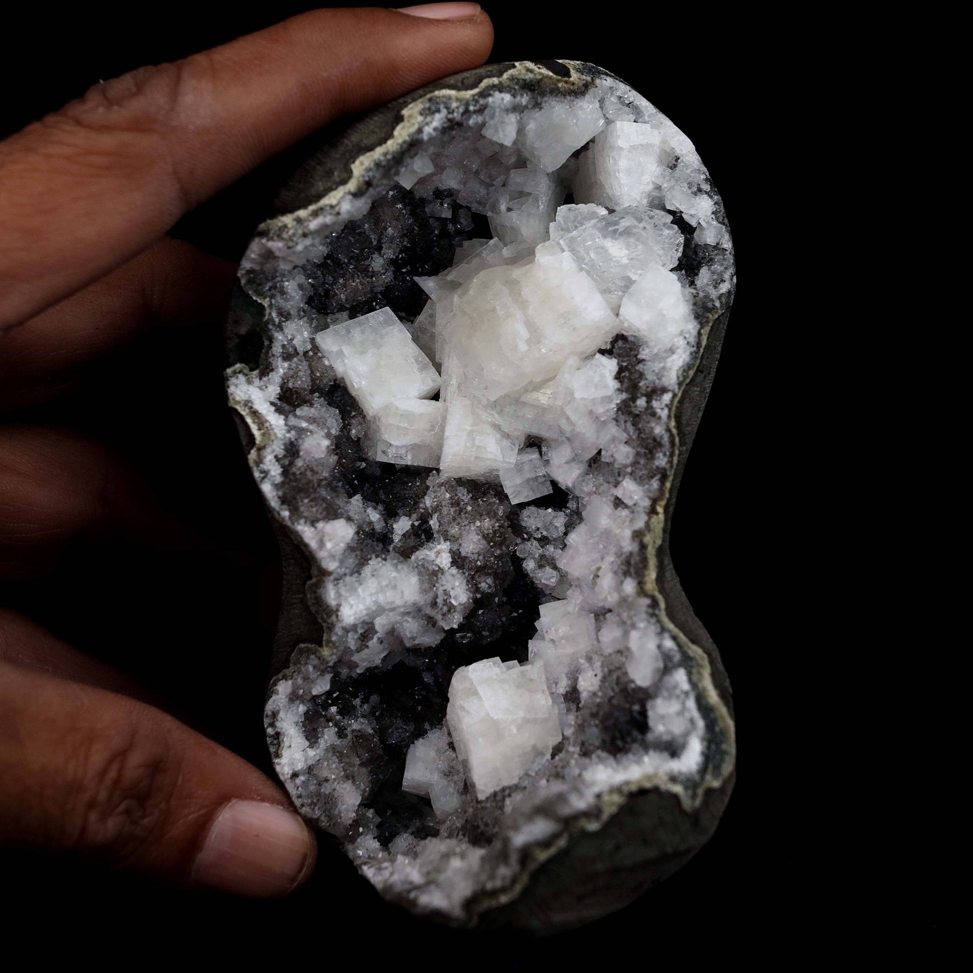 Chabazite Pesudeo Crystals inside Chalcedony Vug Natural Mineral Speci…  https://www.superbminerals.us/products/chabazite-pesudeo-crystals-inside-chalcedony-vug-natural-mineral-specimen-b-4661  Features: Exquisite basalt vug lined with sparkly drusy chalcedony, and containing excellent crystals of Chabazite. The Chabazite is over across, has superb luster, and appears to be twinned. The Epistilbite crystals are tall and have good luster. A great combination piece.Primary Mineral(s): Chabazite