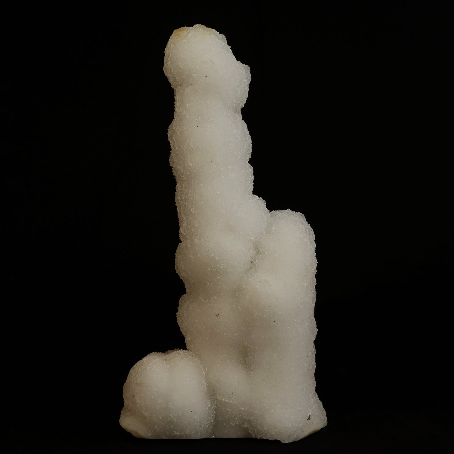 A Chalcedony stalactite that is colourless, dazzling, and translucent, ascending from a Chalcedony plate (or as it was in its original location, descending down . . . ). A lovely and natural formation — a wonderful aesthetic object in superb condition. 