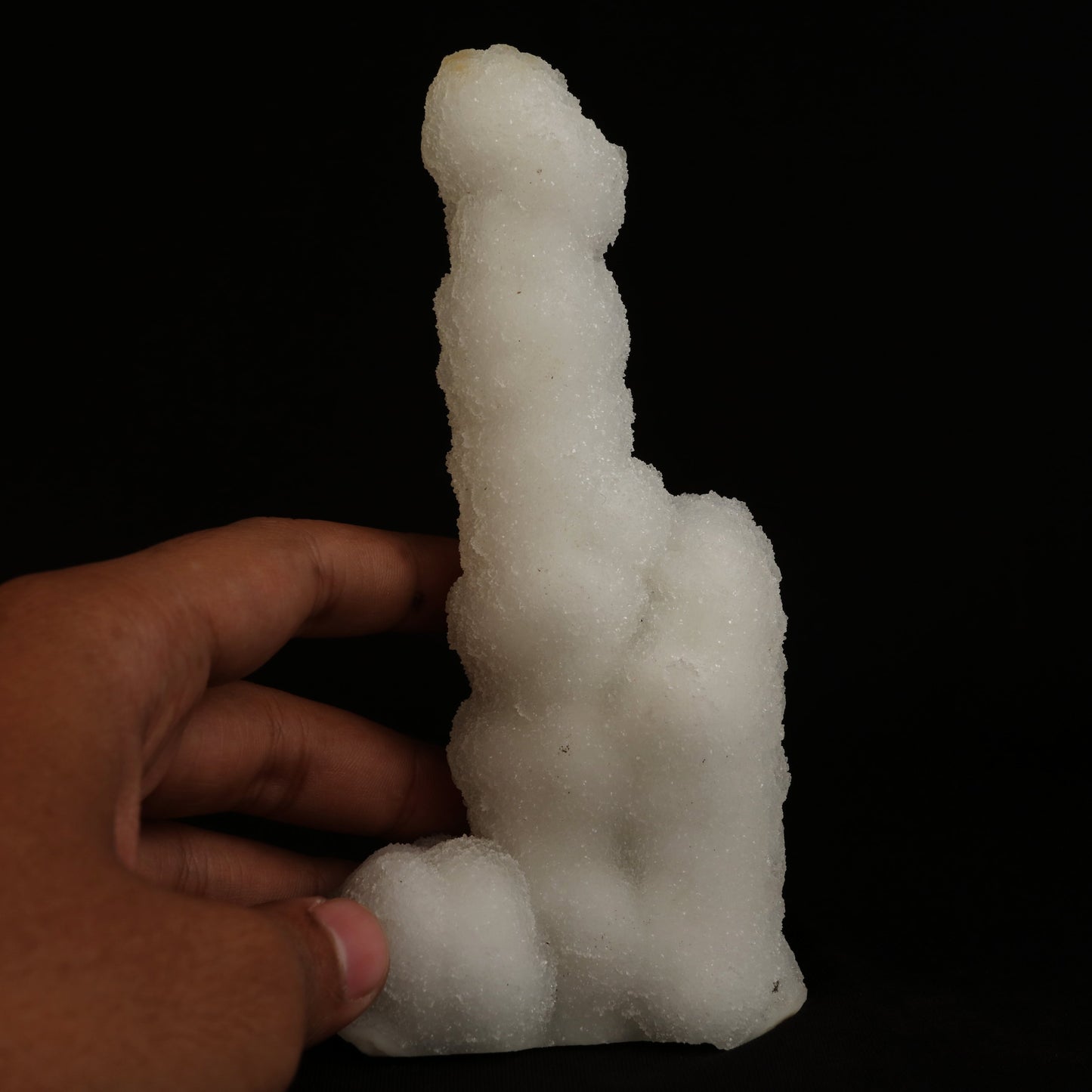 A Chalcedony stalactite that is colourless, dazzling, and translucent, ascending from a Chalcedony plate (or as it was in its original location, descending down . . . ). A lovely and natural formation — a wonderful aesthetic object in superb condition. 