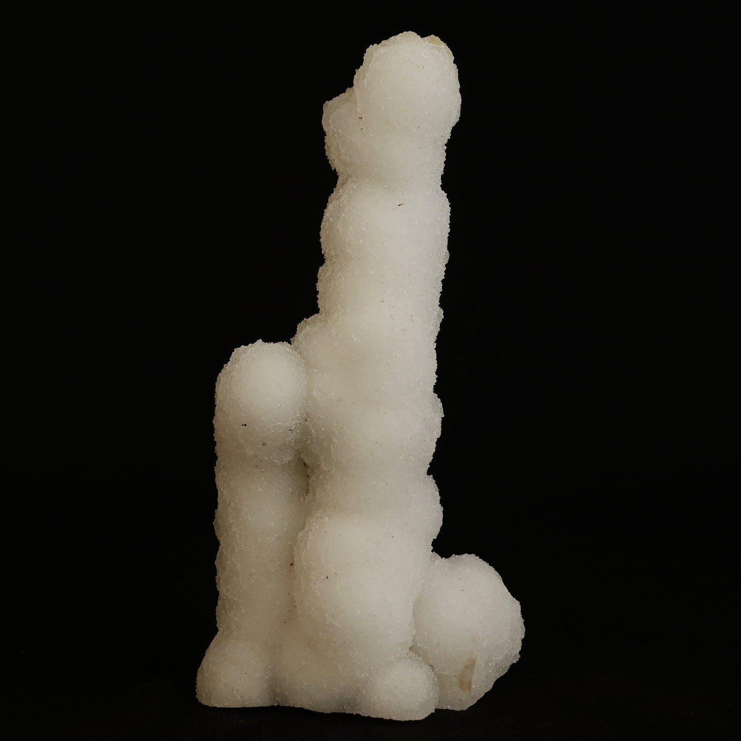 A Chalcedony stalactite that is colourless, dazzling, and translucent, ascending from a Chalcedony plate (or as it was in its original location, descending down . . . ). A lovely and natural formation — a wonderful aesthetic object in superb condition. 