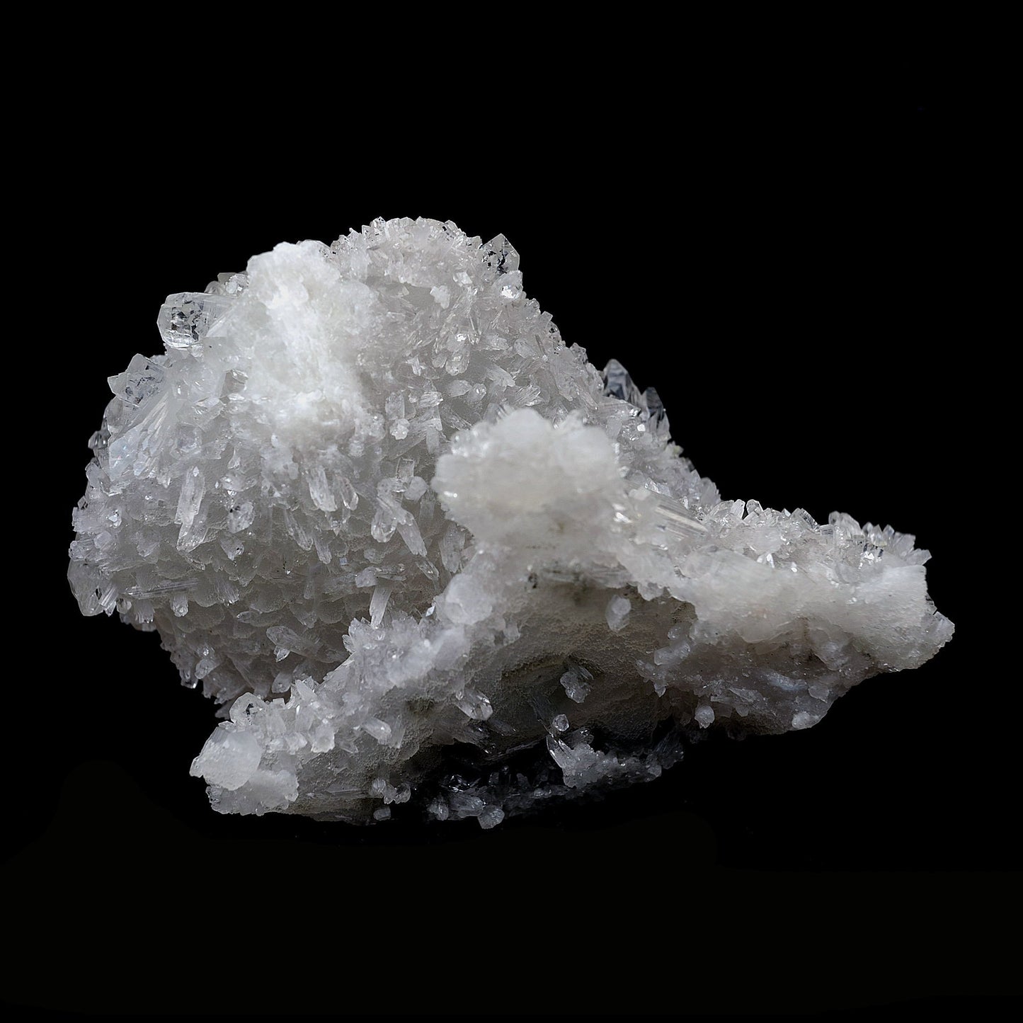 Coated Calcite with Gemmy Apophyllite Natural Mineral Specimen # B 410…  https://www.superbminerals.us/products/coated-calcite-with-gemmy-apophyllite-natural-mineral-specimen-b-4105  Features:Lustrous transparent-to-translucent colorless Apophyllite crystals with translucent gemmy bladed coated calcite crystals covering the front face of a prismatic Apophyllite crystal that is coated with sugar-like Calcite microcrystals.Primary Mineral(s): ApophylliteSecondary Mineral(s): 