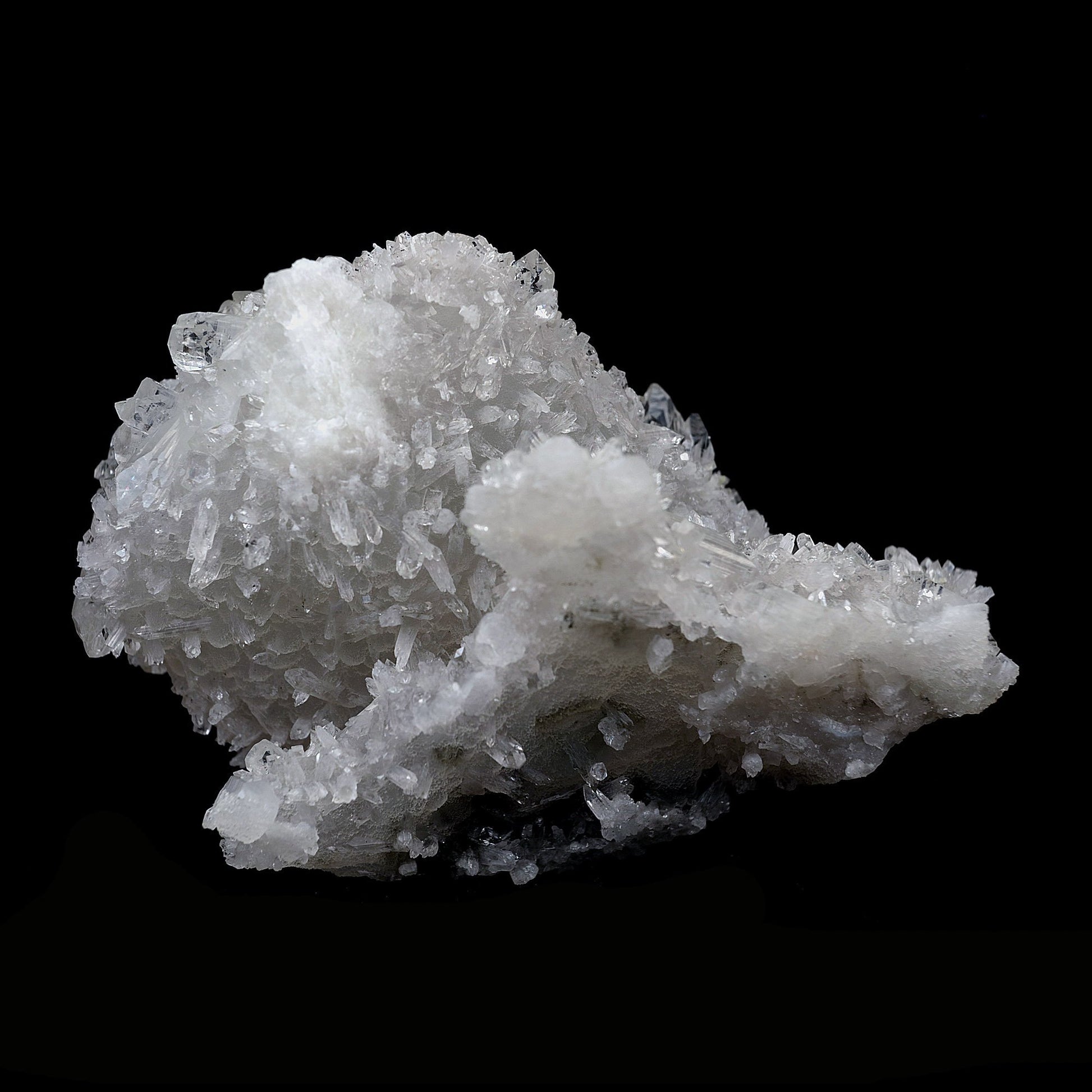 Coated Calcite with Gemmy Apophyllite Natural Mineral Specimen # B 410…  https://www.superbminerals.us/products/coated-calcite-with-gemmy-apophyllite-natural-mineral-specimen-b-4105  Features:Lustrous transparent-to-translucent colorless Apophyllite crystals with translucent gemmy bladed coated calcite crystals covering the front face of a prismatic Apophyllite crystal that is coated with sugar-like Calcite microcrystals.Primary Mineral(s): ApophylliteSecondary Mineral(s): 