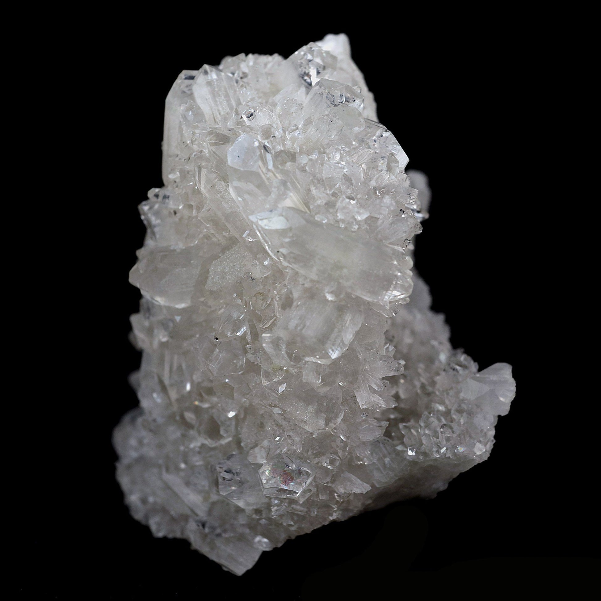 Coated Calcite with Gemmy Apophyllite Natural Mineral Specimen # B 410…  https://www.superbminerals.us/products/coated-calcite-with-gemmy-apophyllite-natural-mineral-specimen-b-4105  Features:Lustrous transparent-to-translucent colorless Apophyllite crystals with translucent gemmy bladed coated calcite crystals covering the front face of a prismatic Apophyllite crystal that is coated with sugar-like Calcite microcrystals.Primary Mineral(s): ApophylliteSecondary Mineral(s): 