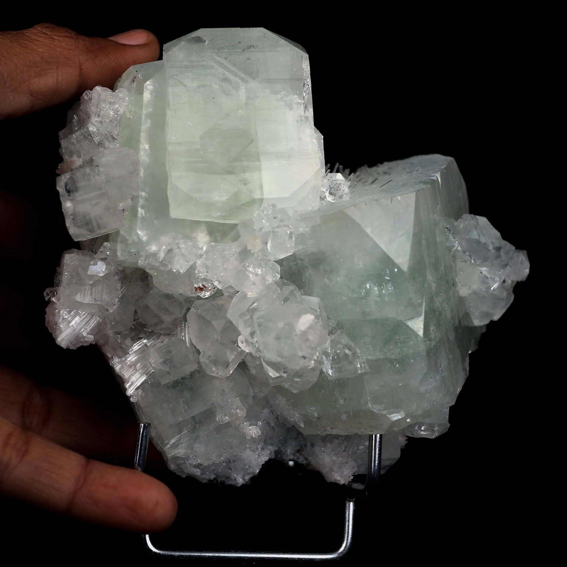 Fluorapophyllite Twin big Crystal with Stilbite Natural Mineral Specim…  https://www.superbminerals.us/products/fluorapophyllite-twin-big-crystal-natural-mineral-specimen-b-4641  Features: A typical Deccan Trap association specimen with strong, extremely glossy, crisp, well-formed, blocky, green and colourless Fluorapophyllite crystals (K).which are linked with extremely glossy, delicate peach coloured Stilbite-Ca "sheaves" A Chalcedony "core" may be seen in a tiny region on the back.