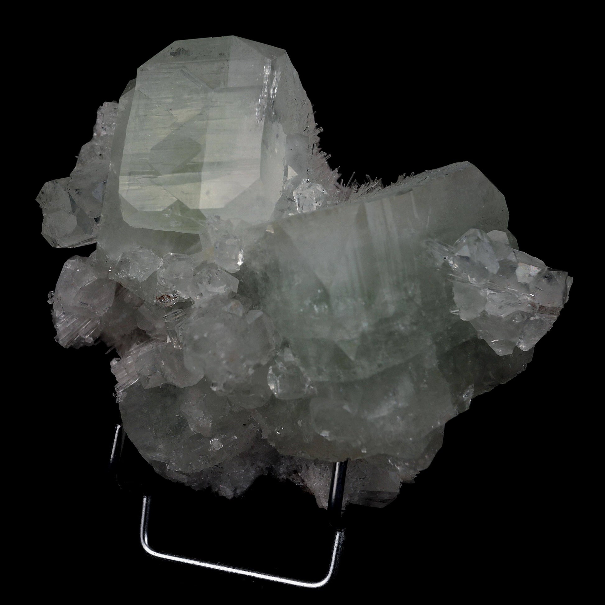 Fluorapophyllite Twin big Crystal with Stilbite Natural Mineral Specim…  https://www.superbminerals.us/products/fluorapophyllite-twin-big-crystal-natural-mineral-specimen-b-4641  Features: A typical Deccan Trap association specimen with strong, extremely glossy, crisp, well-formed, blocky, green and colourless Fluorapophyllite crystals (K).which are linked with extremely glossy, delicate peach coloured Stilbite-Ca "sheaves" A Chalcedony "core" may be seen in a tiny region on the back.