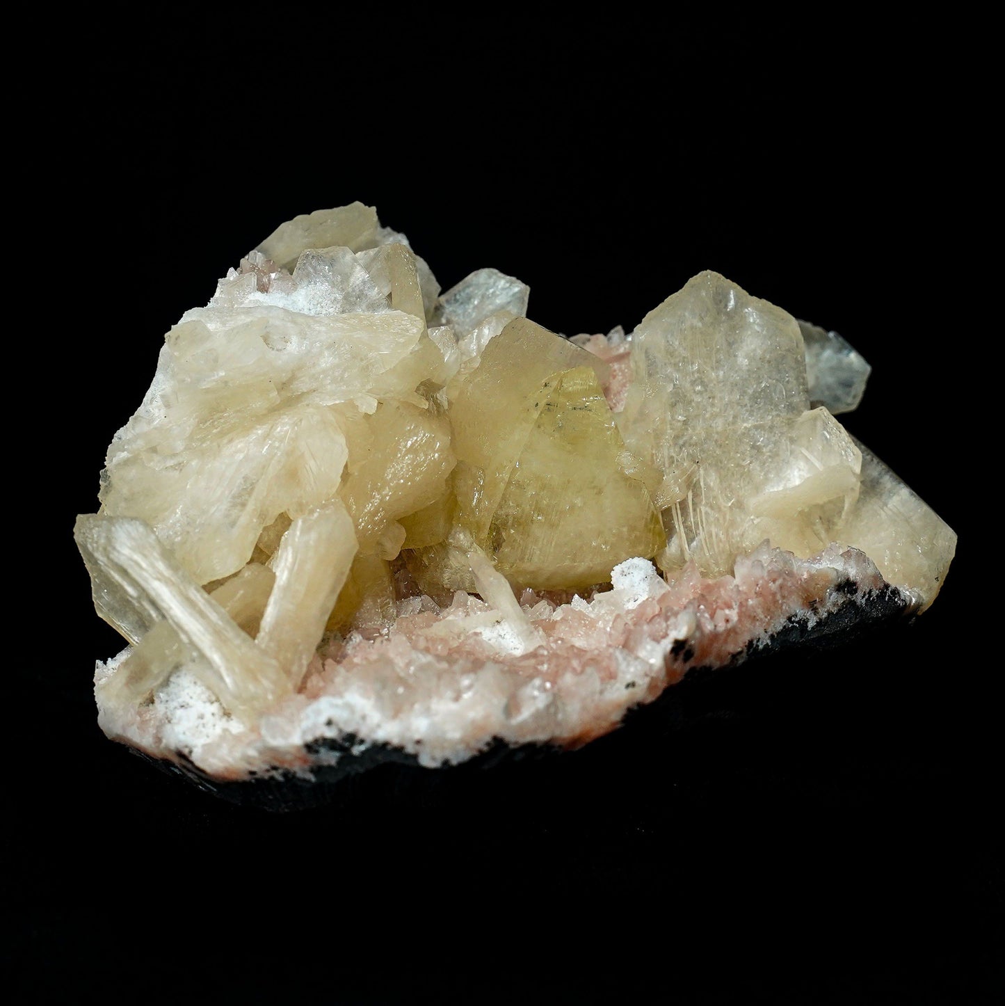 Fluorescent Powellite with Stilbite, Heulandite (Rare Find) Natural Mi…  https://www.superbminerals.us/products/fluorescent-powellite-with-stilbite-heulandite-natural-mineral-specimen-b-4972  Features: Beautiful specimen of gemmy Powellite crystal with Stilbite and Heulandite crystals from Nashik District, India. Powellite is the rarest and most desirable mineral from the Deccan Traps of India.&nbsp; It displays pleasing golden color doubly terminated Powellite crystal aesthetically growing on Heulandite