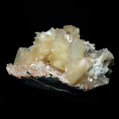 Fluorescent Powellite with Stilbite, Heulandite (Rare Find) Natural Mi…  https://www.superbminerals.us/products/fluorescent-powellite-with-stilbite-heulandite-natural-mineral-specimen-b-4972  Features: Beautiful specimen of gemmy Powellite crystal with Stilbite and Heulandite crystals from Nashik District, India. Powellite is the rarest and most desirable mineral from the Deccan Traps of India.&nbsp; It displays pleasing golden color doubly terminated Powellite crystal aesthetically growing on Heulandite