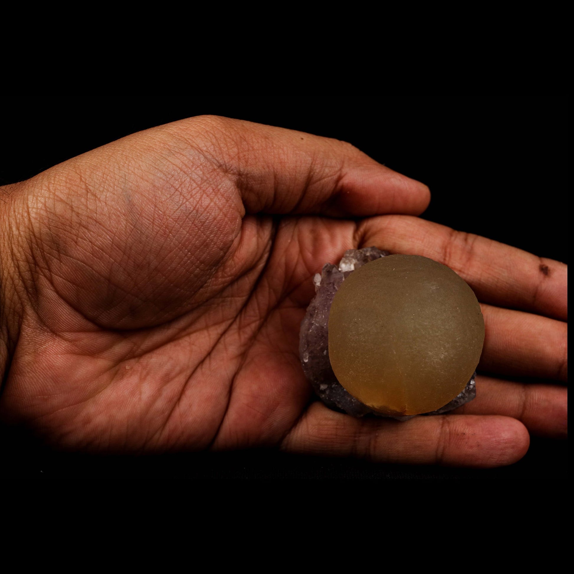 Fluorite Botridoal on Amethyst Natural Mineral Specimen # B 5194  https://www.superbminerals.us/products/fluorite-botridoal-on-amethyst-natural-mineral-specimen-b-5194  Features: An extremely botryoidal "ball" of Fluorite perches above an incredibly rich purple-colored Amethyst on Chalcedony and host rock matrix, resulting in an unusually stunning specimen. The Fluorite is a creamy-white tone on the surface that gradually fades away to a golden tint in the centre.