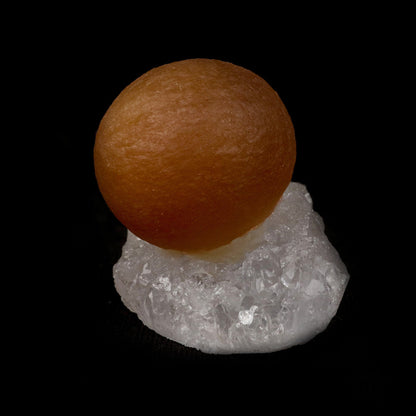 Fluorite Botridoal on MM Quartz Natural Mineral Specimen # B 5143  https://www.superbminerals.us/products/fluorite-botridoal-on-mm-quartz-natural-mineral-specimen-b-5143  Features: These golden botryoidal fluorites are unique and extremely attractive. This specimen features a a very gemmy, good sized, rich golden color, fluorite "sphere" on gemmy, colorless, stubby quartz crystal matrix. Primary Mineral(s): Fluorite Secondary Mineral(s): MM QuartzMatrix: N/A 1.5 Inch x 1 Inch