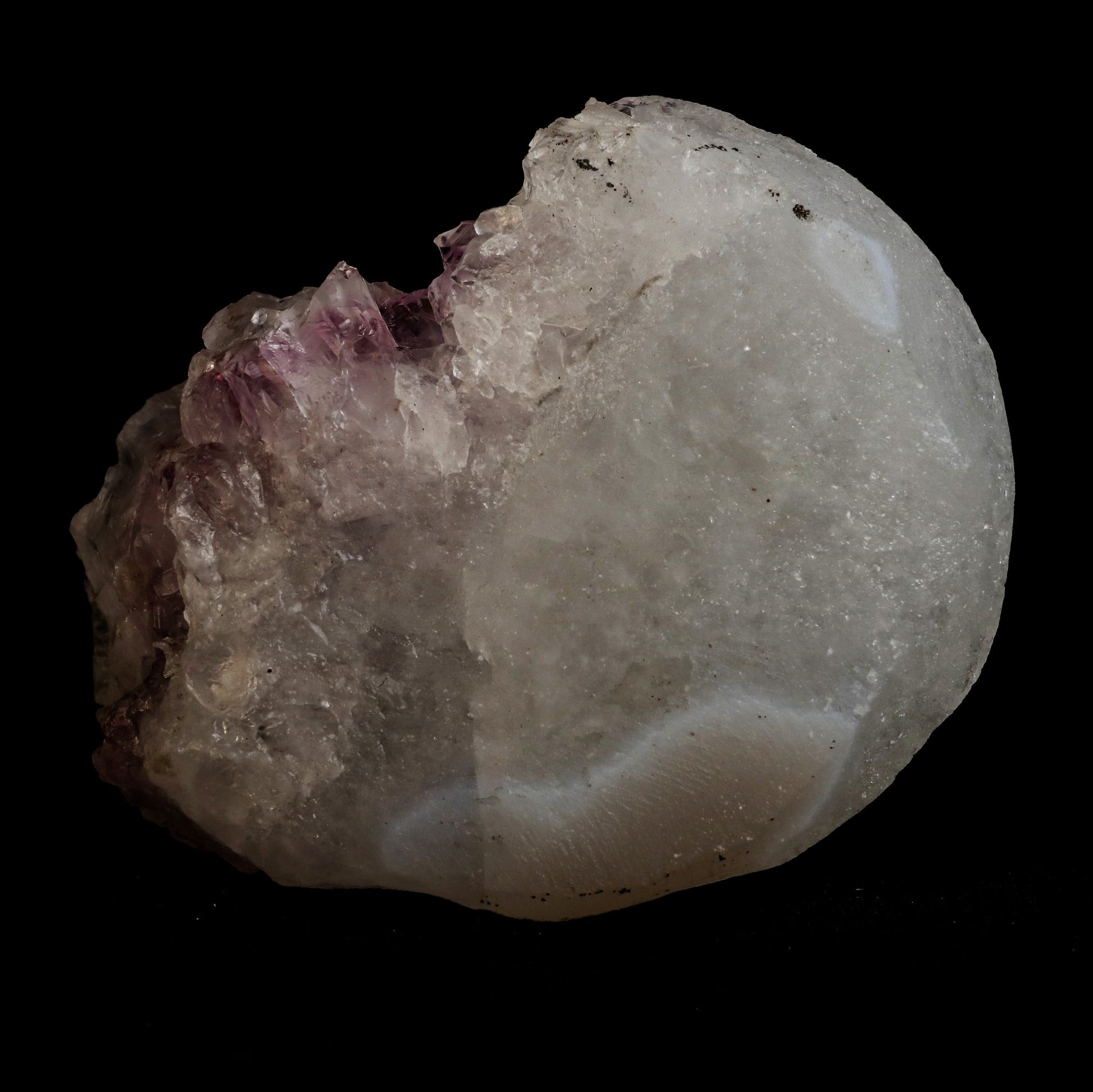 Fluorite Botryoidal on Amethyst Natural Mineral Specimen # B 5058  https://www.superbminerals.us/products/fluorite-botryoidal-on-amethyst-natural-mineral-specimen-b-5058  Features: An extraordinarily botryoidal "ball" of Fluorite is perched atop an exceptionally rich purple coloured Amethyst on Chalcedony and host rock matrix, creating an unusually beautiful specimen.&nbsp; On the surface, the Fluorite is a creamy-white tone that gradually fades away to a golden hue in the middle.