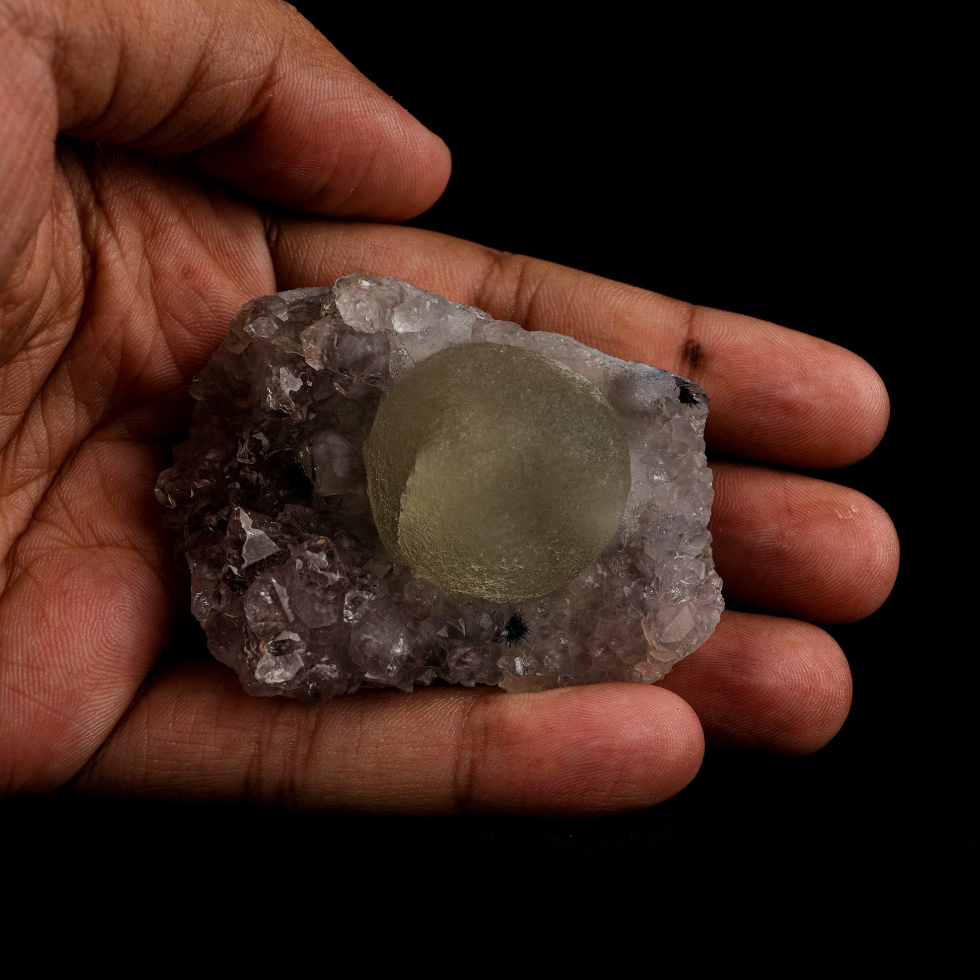 Fluorite Botryoidal on Amethyst Natural Mineral Specimen # B 5107  https://www.superbminerals.us/products/fluorite-botryoidal-on-amethyst-natural-mineral-specimen-b-5107  Features: An extraordinarily botryoidal "ball" of Fluorite is perched atop an exceptionally rich purple coloured Amethyst on Chalcedony and host rock matrix, creating an unusually beautiful specimen.&nbsp; On the surface, the Fluorite is a creamy-white tone that gradually fades away to a golden hue in the middle