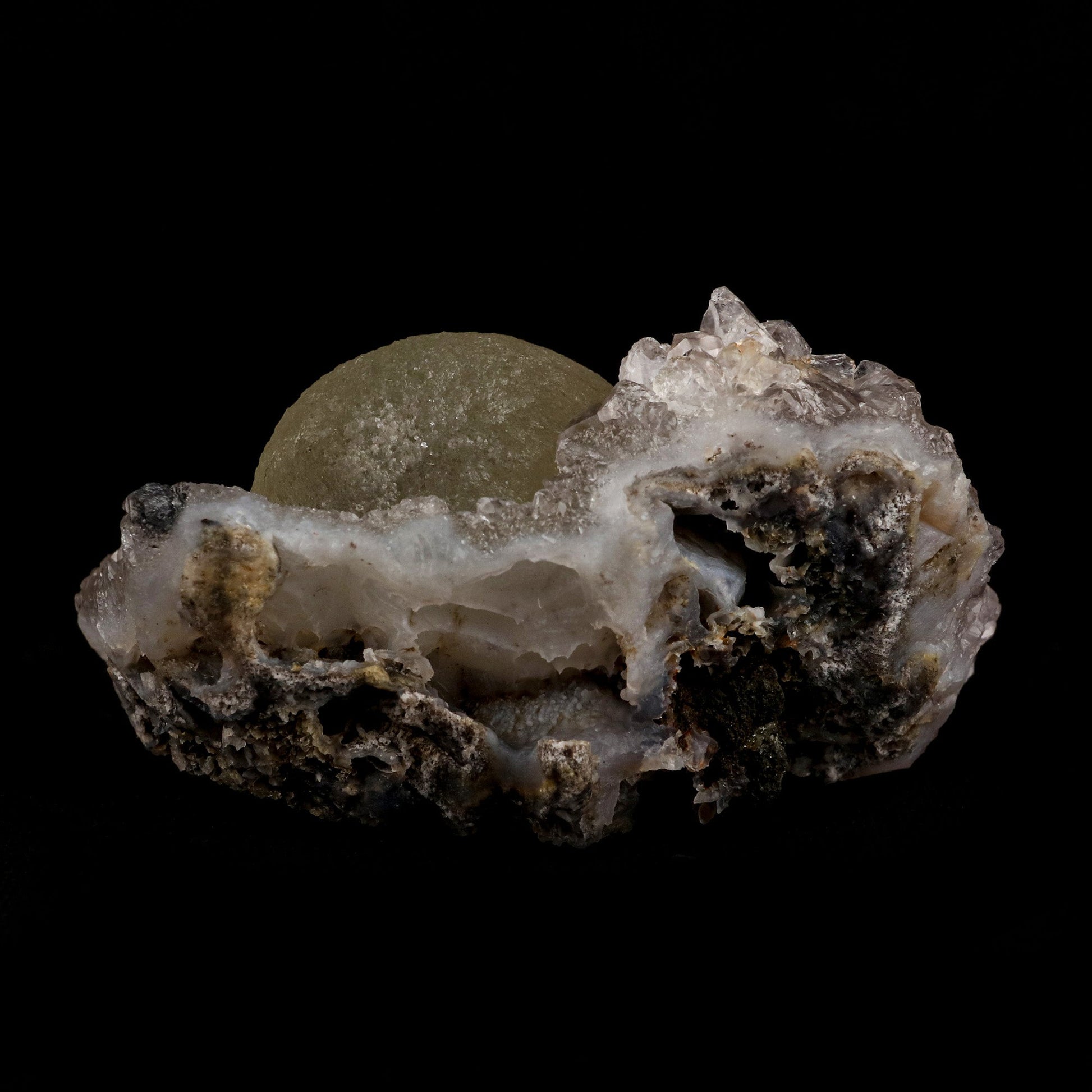 Fluorite Botryoidal on Amethyst Natural Mineral Specimen # B 5107  https://www.superbminerals.us/products/fluorite-botryoidal-on-amethyst-natural-mineral-specimen-b-5107  Features: An extraordinarily botryoidal "ball" of Fluorite is perched atop an exceptionally rich purple coloured Amethyst on Chalcedony and host rock matrix, creating an unusually beautiful specimen.&nbsp; On the surface, the Fluorite is a creamy-white tone that gradually fades away to a golden hue in the middle