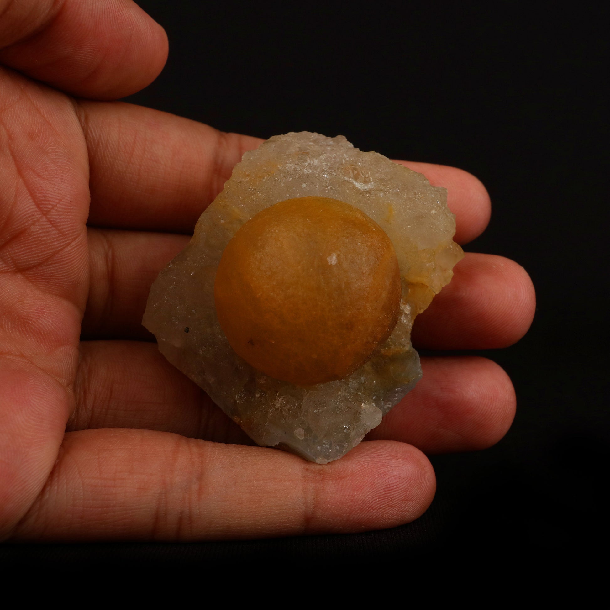 Fluorite Botryoidal On MM Quartz Natural Mineral Specimen # B 5091  https://www.superbminerals.us/products/fluorite-botryoidal-on-mm-quartz-natural-mineral-specimen-b-5091  Features: These golden botryoidal fluorites are unique and extremely attractive. This specimen features a a very gemmy, good sized, rich golden color, fluorite "sphere" on gemmy, colorless, stubby quartz crystal matrix. Primary Mineral(s): FluoriteSecondary Mineral(s): MM QuartzMatrix: N/A 2 Inch x 1.5 InchWeight : 89 …