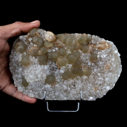 Fluorite Botryoidal on MM Quartz Plate Natural Mineral Specimen # B 39…  https://www.superbminerals.us/products/fluorite-botryoidal-on-mm-quartz-plate-natural-mineral-specimen-b-3976  Features Small, botryoidal fluorite crystals, ranging in colour from creamy to yellow, sit on a plate of quartz crystals. Usually they are half-buried. to have one stick out so nicely, and on such a balanced matrix. Primary Mineral(s): Fluorite Secondary Mineral(s): MM QuartzMatrix: N/A18 cm x 10 cm1150 GmsLocality