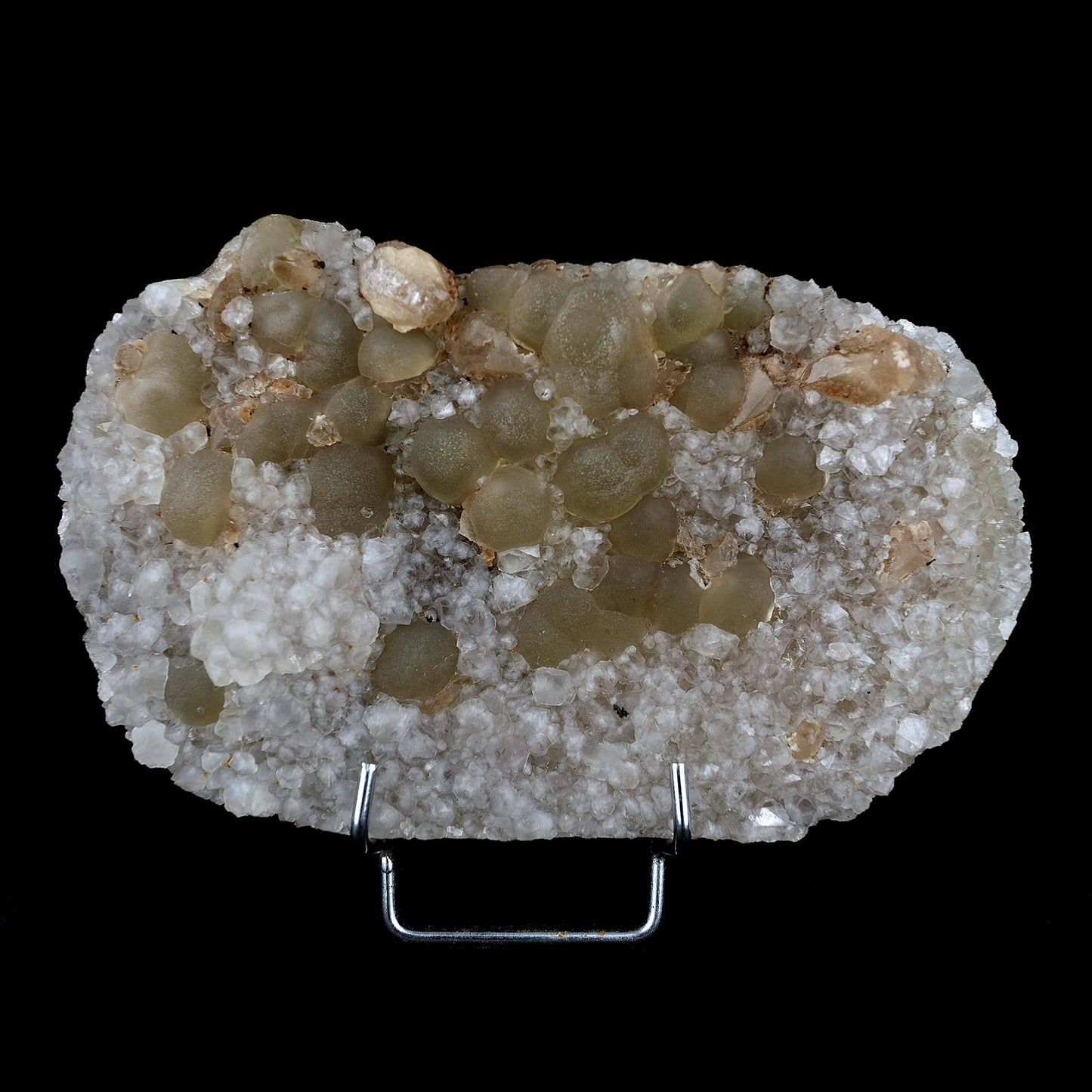 Fluorite Botryoidal on MM Quartz Plate Natural Mineral Specimen # B 39…  https://www.superbminerals.us/products/fluorite-botryoidal-on-mm-quartz-plate-natural-mineral-specimen-b-3976  Features Small, botryoidal fluorite crystals, ranging in colour from creamy to yellow, sit on a plate of quartz crystals. Usually they are half-buried. to have one stick out so nicely, and on such a balanced matrix. Primary Mineral(s): Fluorite Secondary Mineral(s): MM QuartzMatrix: N/A18 cm x 10 cm1150 GmsLocality