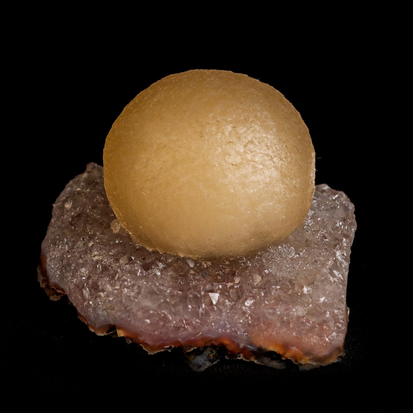 Fluorite Botryoidal on Quartz Natural Mineral Specimen # B 5039  https://www.superbminerals.us/products/fluorite-botriodal-on-quartz-natural-mineral-specimen-b-5039  Features:&nbsp;This specimen is a great example of this well-known material, with a delicate golden-yellow sphere sitting on a somewhat smokey colour Quartz crystal matrix.It's crucial to note that the Quartz is crystallised, as many pieces from this locality have Fluorite atop cryptocrystalline Quartz