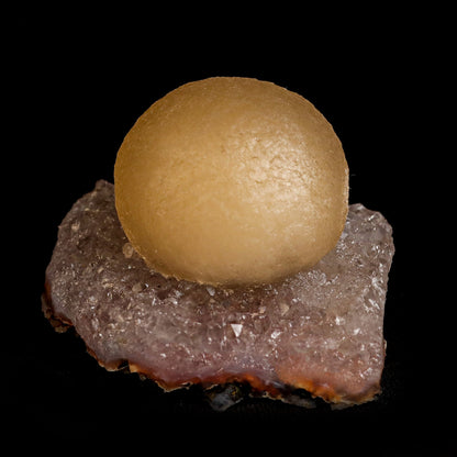 Fluorite Botryoidal on Quartz Natural Mineral Specimen # B 5039  https://www.superbminerals.us/products/fluorite-botriodal-on-quartz-natural-mineral-specimen-b-5039  Features:&nbsp;This specimen is a great example of this well-known material, with a delicate golden-yellow sphere sitting on a somewhat smokey colour Quartz crystal matrix.It's crucial to note that the Quartz is crystallised, as many pieces from this locality have Fluorite atop cryptocrystalline Quartz