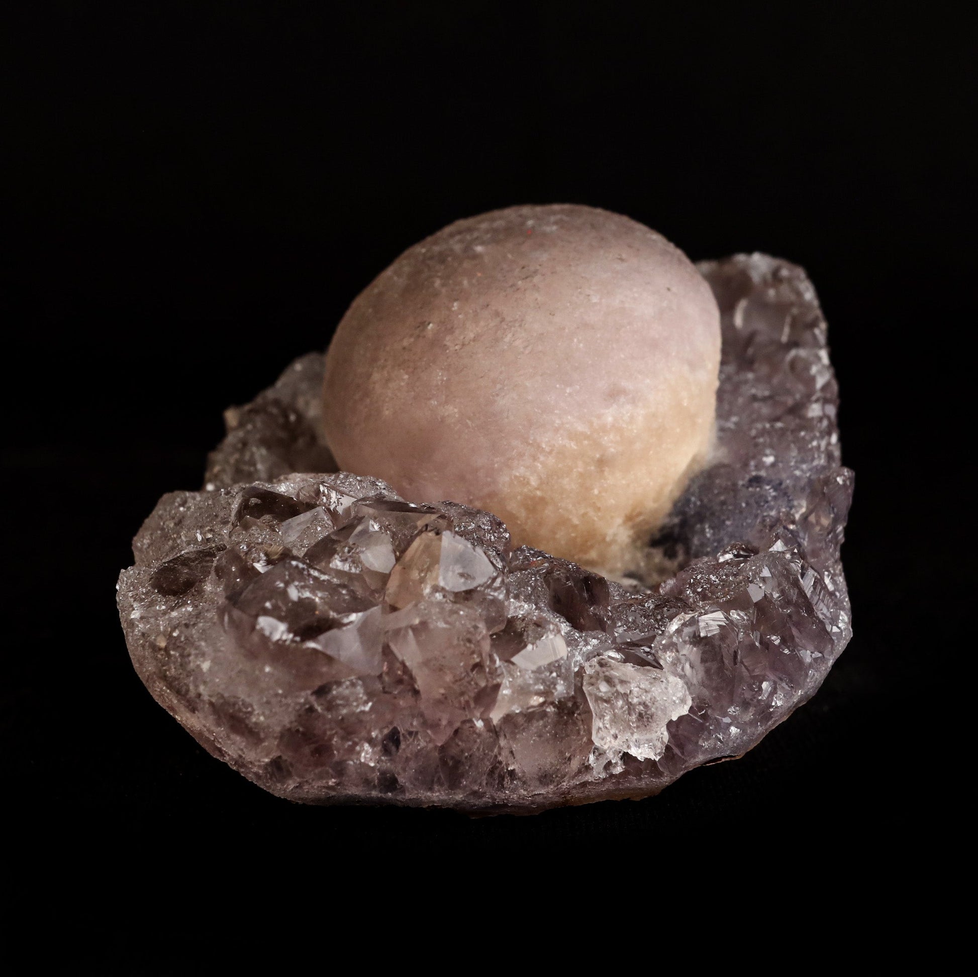 Fluorite Botryoidal on Quartz Natural Mineral Specimen # B 5042  https://www.superbminerals.us/products/fluorite-botryoidal-on-quartz-natural-mineral-specimen-b-5042  Features: This specimen is a great example of this well-known material, with a delicate golden-yellow sphere sitting on a somewhat smokey colour Quartz crystal matrix.It's crucial to note that the Quartz is crystallised, as many pieces from this locality have Fluorite atop cryptocrystalline Quartz, such as Chalcedony