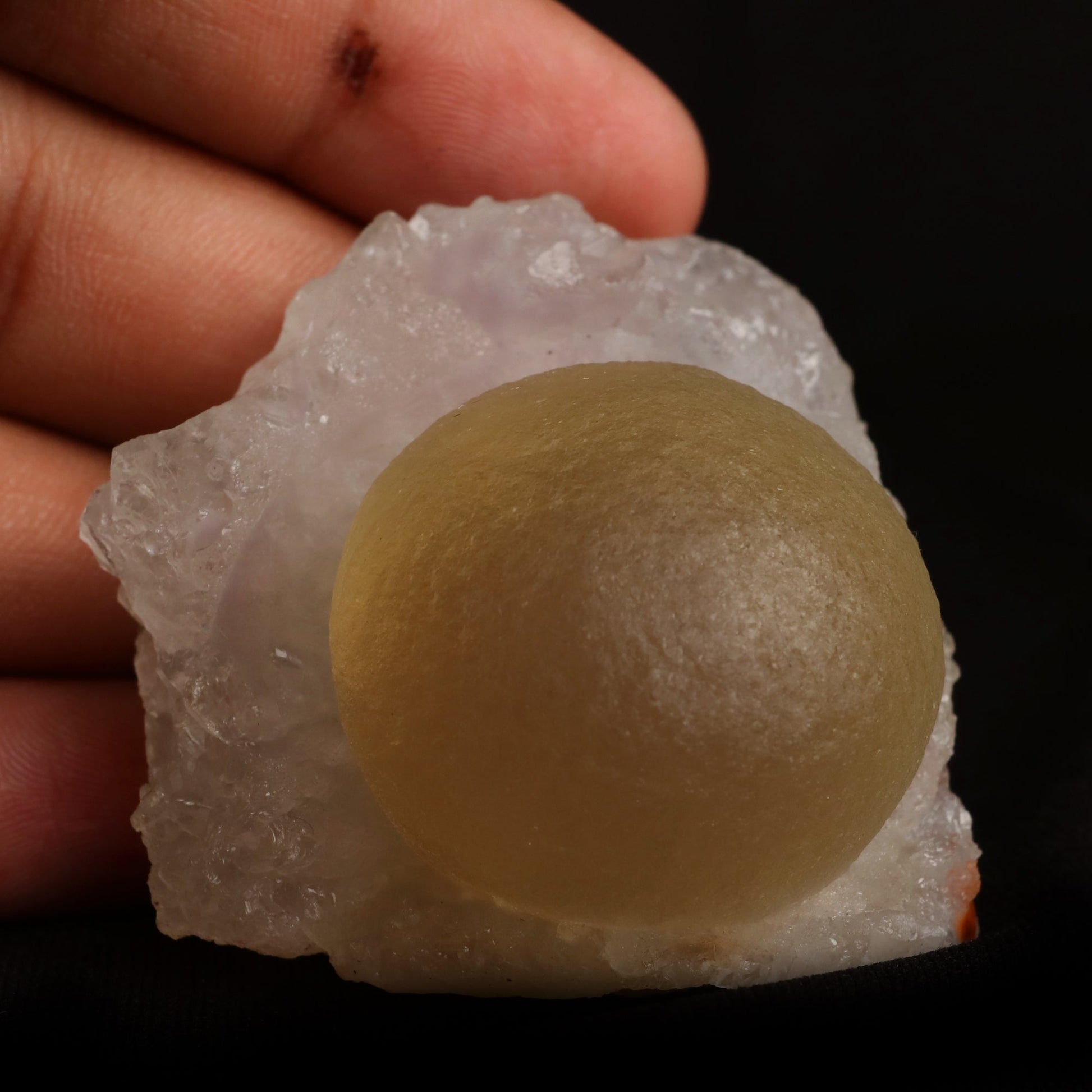 Fluorite (rare botryoidal) on Quartz Natural Mineral Specimen # B 50…  https://www.superbminerals.us/products/fluorite-rare-botryoidal-on-quartz-natural-mineral-specimen-b-5031  Features:&nbsp;This specimen is a great example of this well-known material, with a delicate golden-yellow sphere sitting on a somewhat smokey colour Quartz crystal matrix.It's crucial to note that the Quartz is crystallised, as many pieces from this locality have Fluorite atop cryptocrystalline Quart