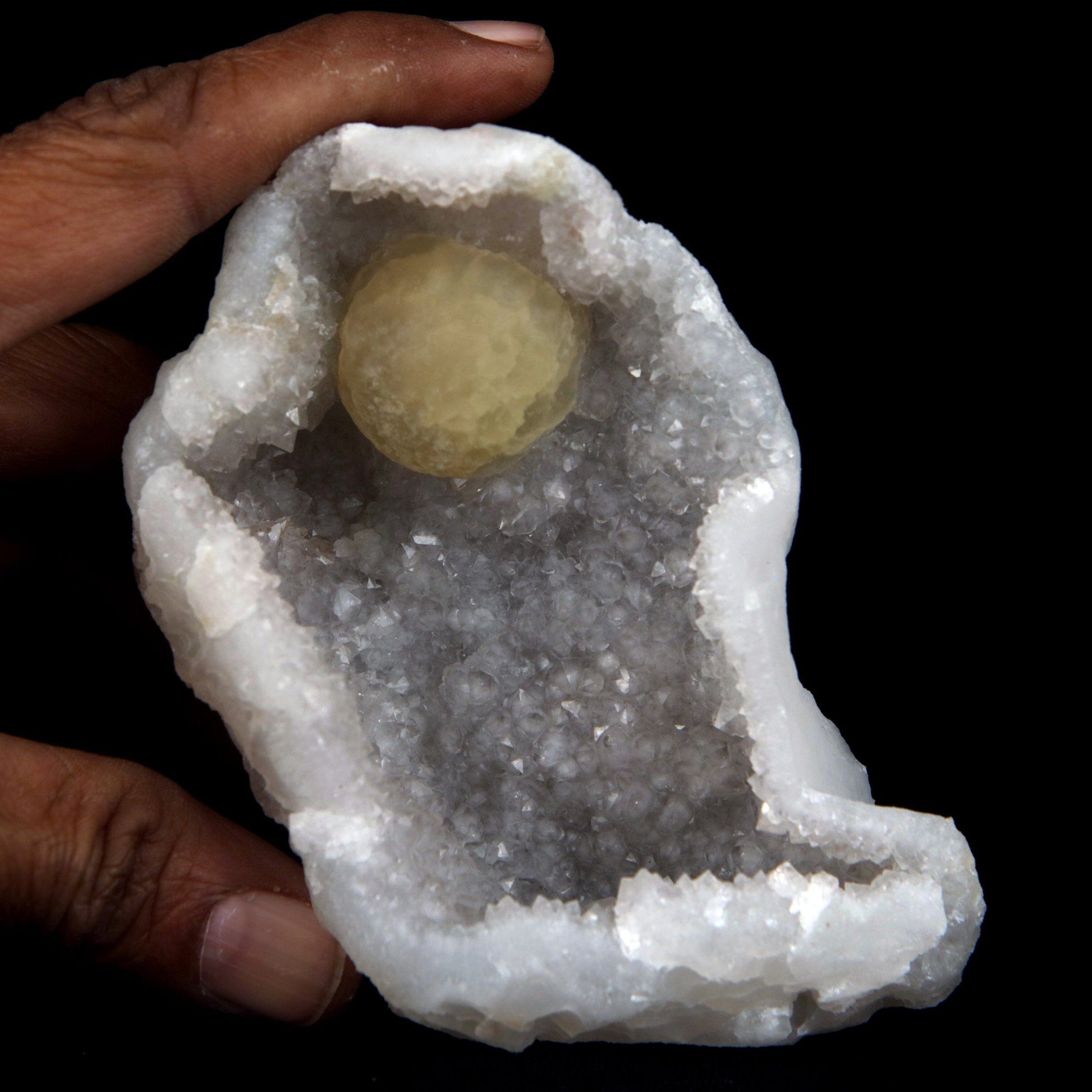 Fluorite (unusually spherical) on MM Quartz Natural Mineral Specimen …  https://www.superbminerals.us/products/fluorite-botryoidal-on-mm-quartz-natural-mineral-specimen-b-4894  Features: This specimen features unusually botryoidal "ball" of Fluorite perched atop notably rich purple coloerless on mm quartz and host rock matrix. The Fluorite ranges in color from a golden hue towards the center, and grades into a creamy-white tone on the exterior. The piece is virtually unduamaged