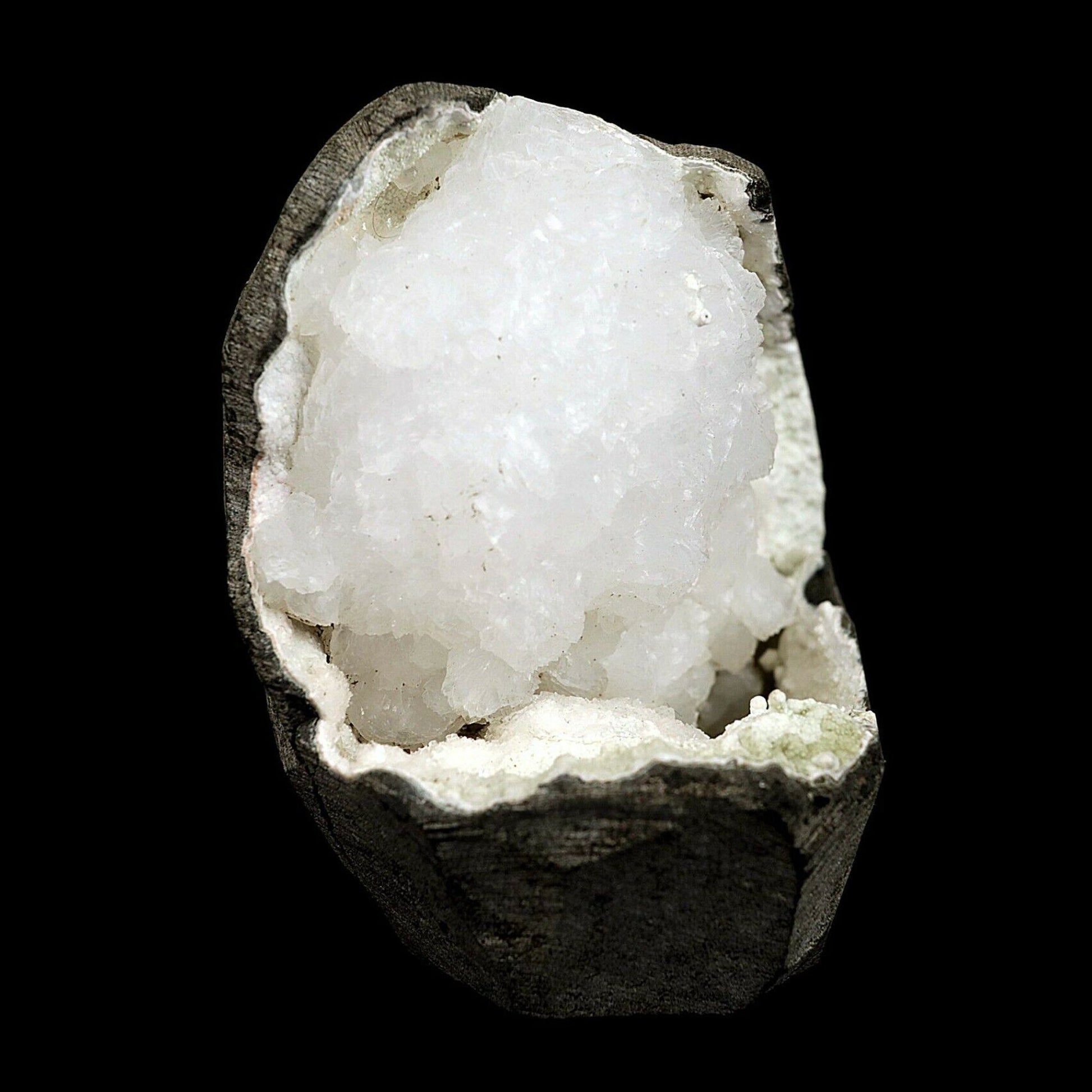 Goosecreekite Rare Mineral on Chalcedony Natural Mineral Specimen # B3569 https://www.superbminerals.us/products/goosecreekite-rare-mineral-on-chalcedony-natural-mineral-specimen-b-3569 This is a wonderful example of goosecreekite, including enormous for-the-species, profoundly shiny, wedge-molded gems which are gemmy and clear/white on a differentiating dark foundation. The goosecreekite sits inside a securing pocket in basalt. Goosecreekite is one of the most extraordinary Indian zeolites
