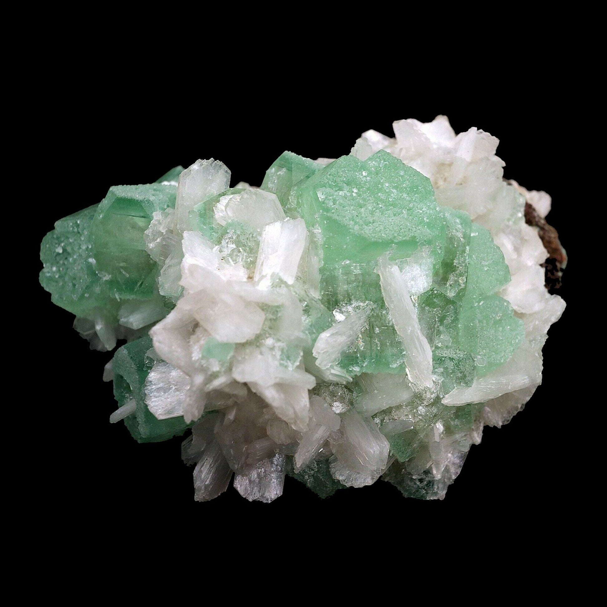 Green Apophyllite Crystal with Stilbite Natural Mineral Specimen # B 3…  https://www.superbminerals.us/products/apophyllite-green-crystal-with-stilbite-natural-mineral-specimen-b-3647  Features:Lovely Green Apophyllite Crystal Cluster Specimen with Stilbite from Aurangabad India. This unique specimen features a large green colored cubic formation Apophyllite with cream colored stilbite. This is a beautiful Zeolite specimen! Primary Mineral(s): ApophylliteSecondary Mineral(s): Stilbite