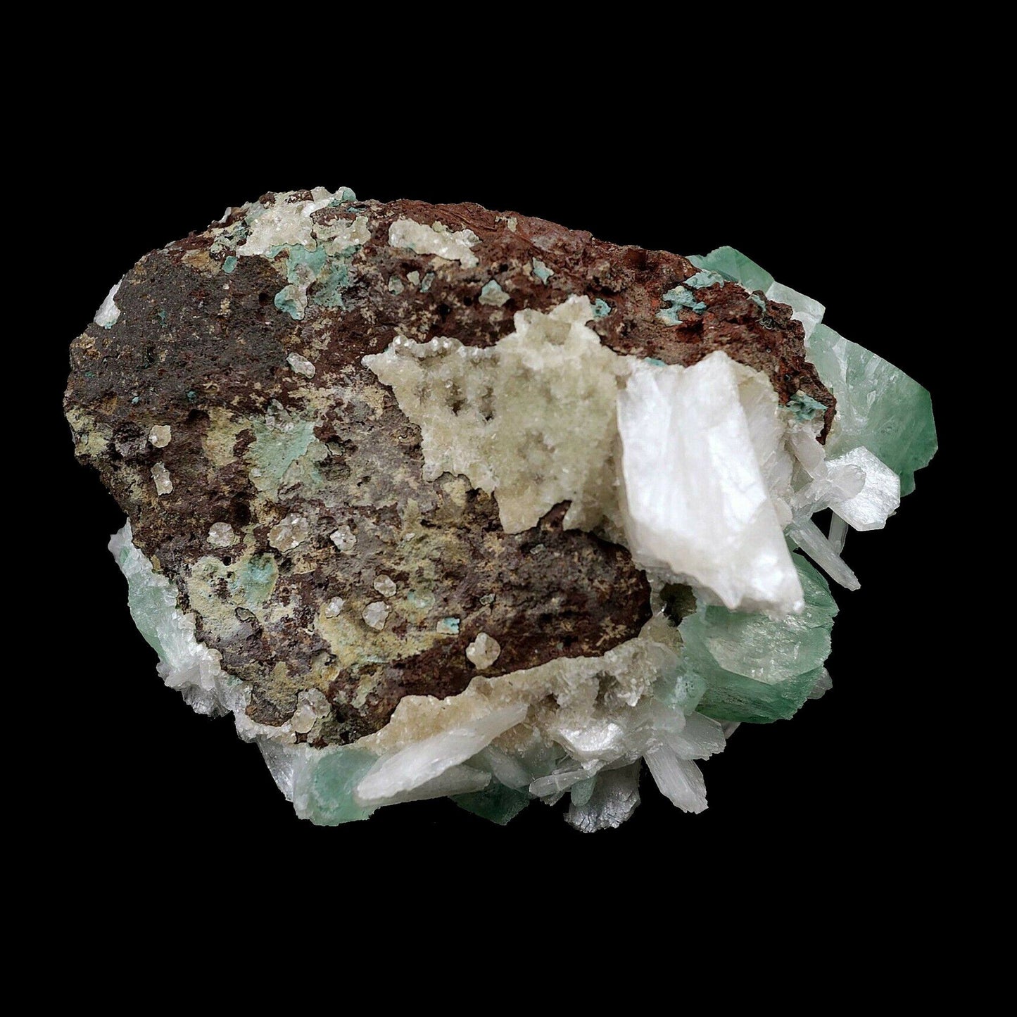 Green Apophyllite Crystal with Stilbite Natural Mineral Specimen # B 3…  https://www.superbminerals.us/products/apophyllite-green-crystal-with-stilbite-natural-mineral-specimen-b-3647  Features:Lovely Green Apophyllite Crystal Cluster Specimen with Stilbite from Aurangabad India. This unique specimen features a large green colored cubic formation Apophyllite with cream colored stilbite. This is a beautiful Zeolite specimen! Primary Mineral(s): ApophylliteSecondary Mineral(s): Stilbite