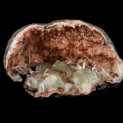 Green Apophyllite Crystals Inside Heulandite Geode Natural Mineral Spe…  https://www.superbminerals.us/products/green-apophyllite-crystals-inside-heulandite-geode-natural-mineral-specimen-b-5254  Features: This beautiful display specimen is a feast of color, texture, and reflections of light. Apophyllite crystals have a high luster on their sides, which contrasts beautifully with their flat, pearl-like terminations. Several acicular sprays of colorless to white, satin and Scolecite. Through the Apophyllite