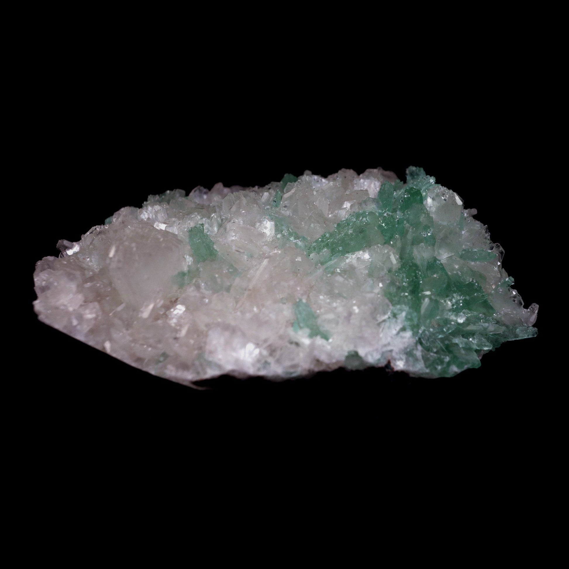 Green Apophyllite Crystals with Stilbite Big Cluster Natural Mineral S…  https://www.superbminerals.us/products/green-apophyllite-crystals-with-stilbite-big-cluster-natural-mineral-specimen-b-4785  Features: Large basalt matrices coated in strikingly beautiful two-toned gemmy tetragonal apophyllite crystals have beautiful starbursts, sprays, and clusters of gemmy, creamy stilbite blades strewn throughout them. The rich mint-green bodies of the apophyllite crystals are terminated by colourless