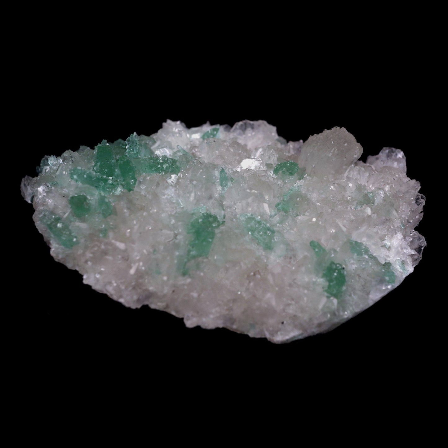 Green Apophyllite Crystals with Stilbite Big Cluster Natural Mineral S…  https://www.superbminerals.us/products/green-apophyllite-crystals-with-stilbite-big-cluster-natural-mineral-specimen-b-4785  Features: Large basalt matrices coated in strikingly beautiful two-toned gemmy tetragonal apophyllite crystals have beautiful starbursts, sprays, and clusters of gemmy, creamy stilbite blades strewn throughout them. The rich mint-green bodies of the apophyllite crystals are terminated by colourless