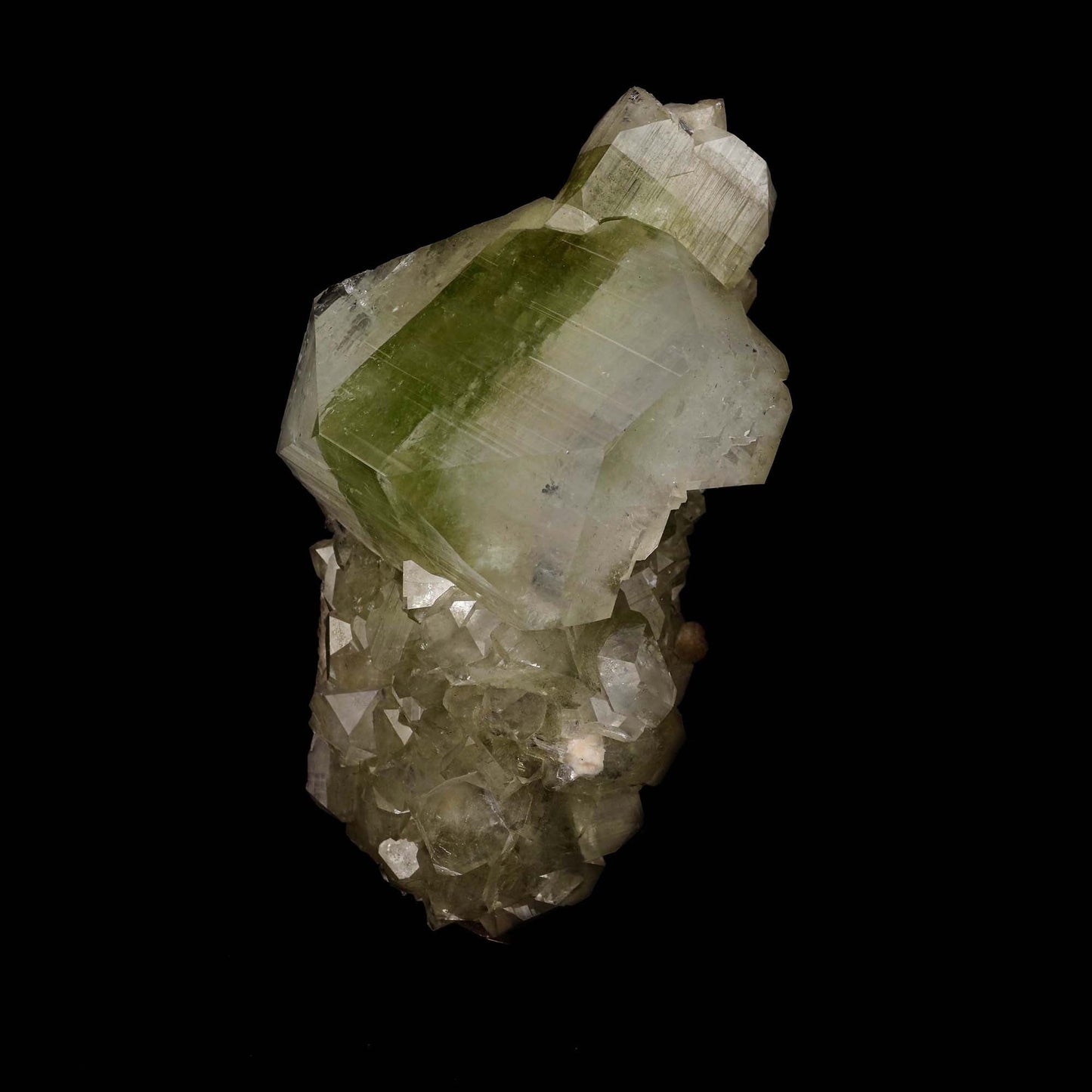Green Apophyllite Cube Natural Mineral Specimen # B 5187  https://www.superbminerals.us/products/green-apophyllite-cube-natural-mineral-specimen-b-5187  Features: This outstanding huge mounded combination from Jalgaon's recent findings is highlighted by a magnificent color-zoned apophyllite crystal bordered by lesser crystals of the same type.The rich mint-green centres and colourless terminations on the glassy, translucent tetragonal apophyllites are offset